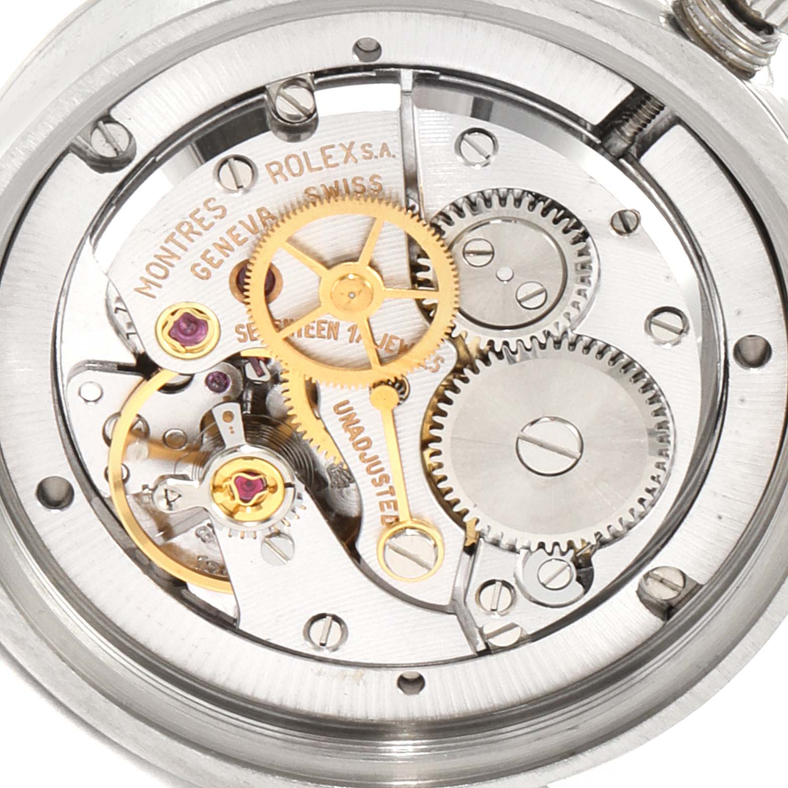 The image shows the internal movement mechanics of a Rolex Vintage Collection 6694 Men's Stainless Steel Silver Dial 6694 Men's Stainless Steel Silver Dial watch, highlighting gears and intricate parts.