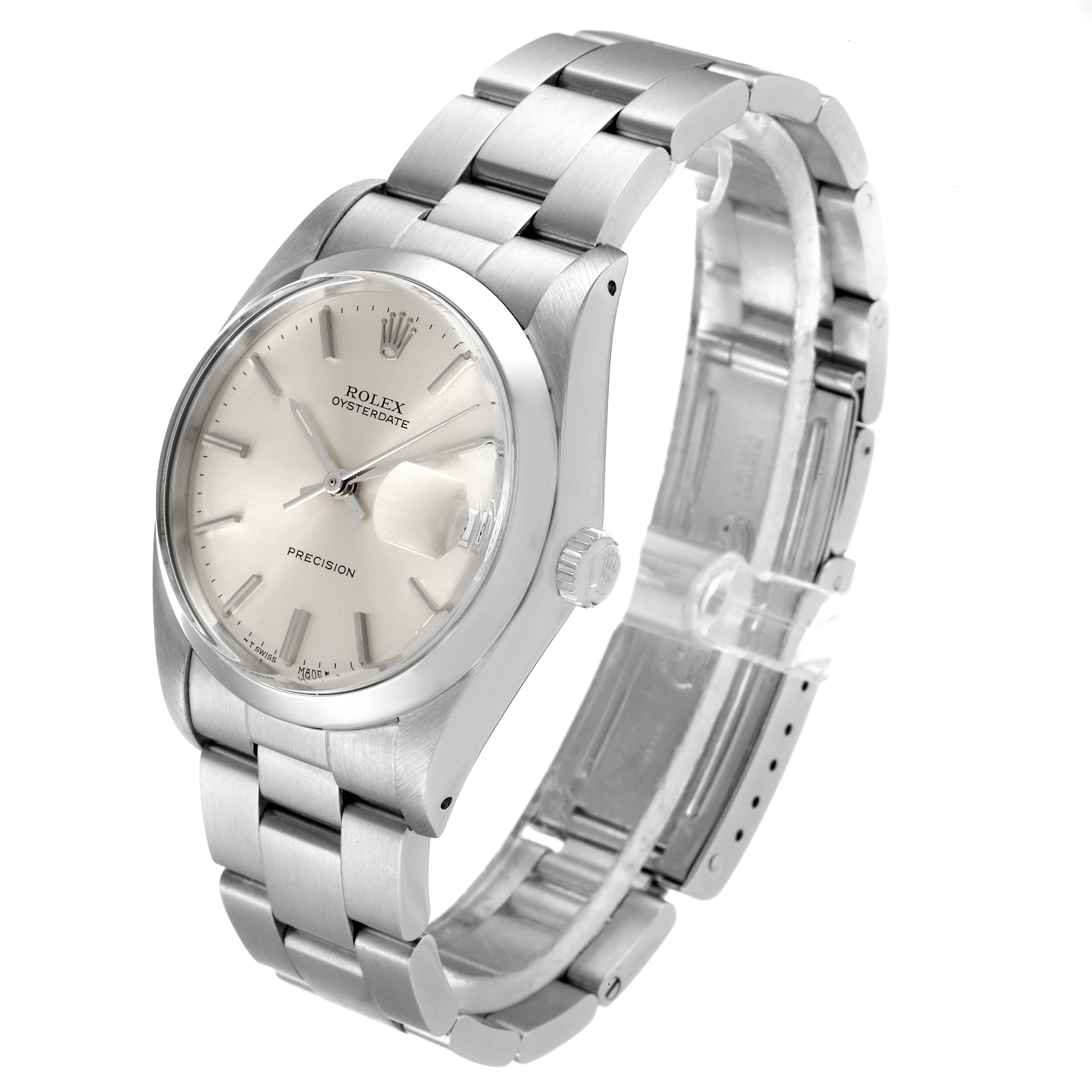 The Vintage Collection Rolex watch is shown at a three-quarter angle, displaying the dial, bezel, crown, and bracelet.