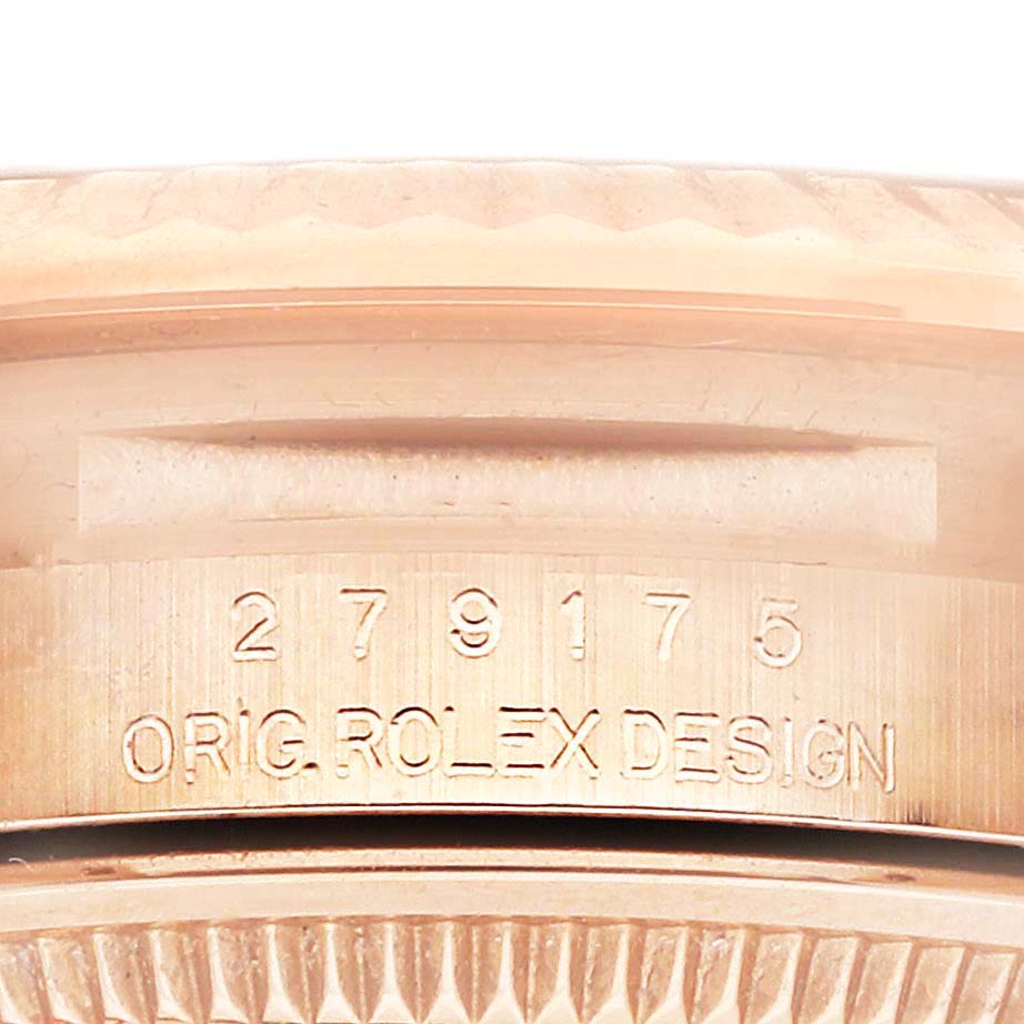 This image shows a close-up of the case side of a Rolex President 279175 Women's Rose Gold Brown Dial watch, featuring the model and "ORIG. ROLEX DESIGN" engraving.