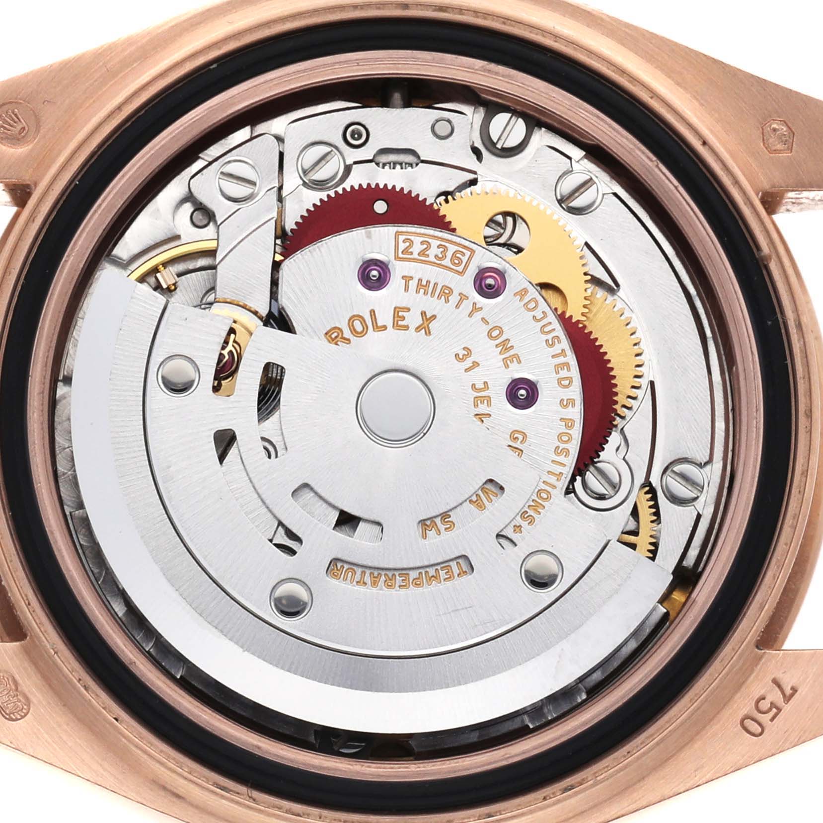 The image shows the movement of a Rolex President 279175 Women's Rose Gold Brown Dial model watch from a top-down angle, highlighting its intricate components.