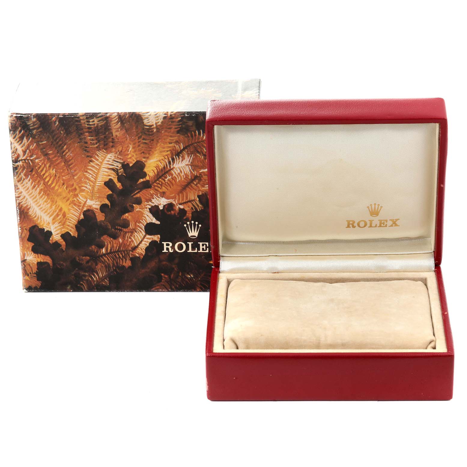 The image shows a Rolex-branded watch box and outer packaging for the President model, with the inner cushion visible.