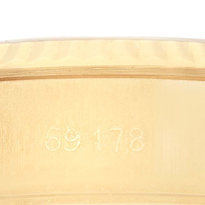 This image shows a close-up of the inner side of the Rolex President 69178 Women's Yellow Gold Champagne Dial 69178 Women's Yellow Gold Champagne Dial model's bezel, displaying the reference number.