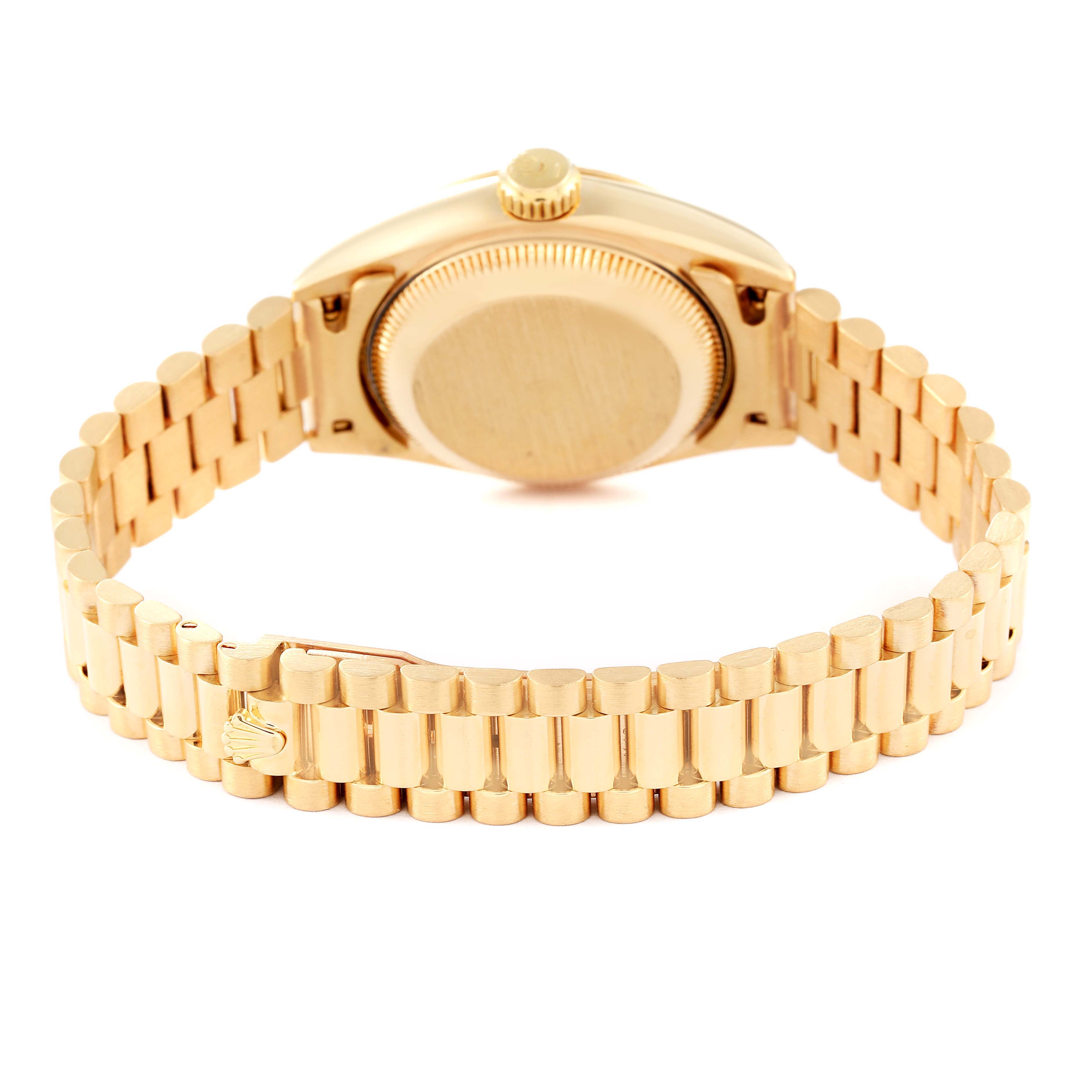 This image shows the back of the Rolex President 69178 Women's Yellow Gold Champagne Dial 69178 Women's Yellow Gold Champagne Dial model watch, focusing on the case back and gold bracelet with the clasp.