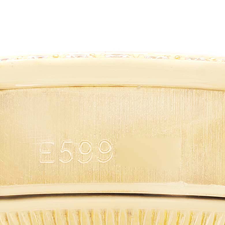 This is a close-up view showing the model number "E599" on the Rolex President 69138 Women
s Yellow Gold Champagne Dial 69138 Women
s Yellow Gold Champagne Dial watch.
