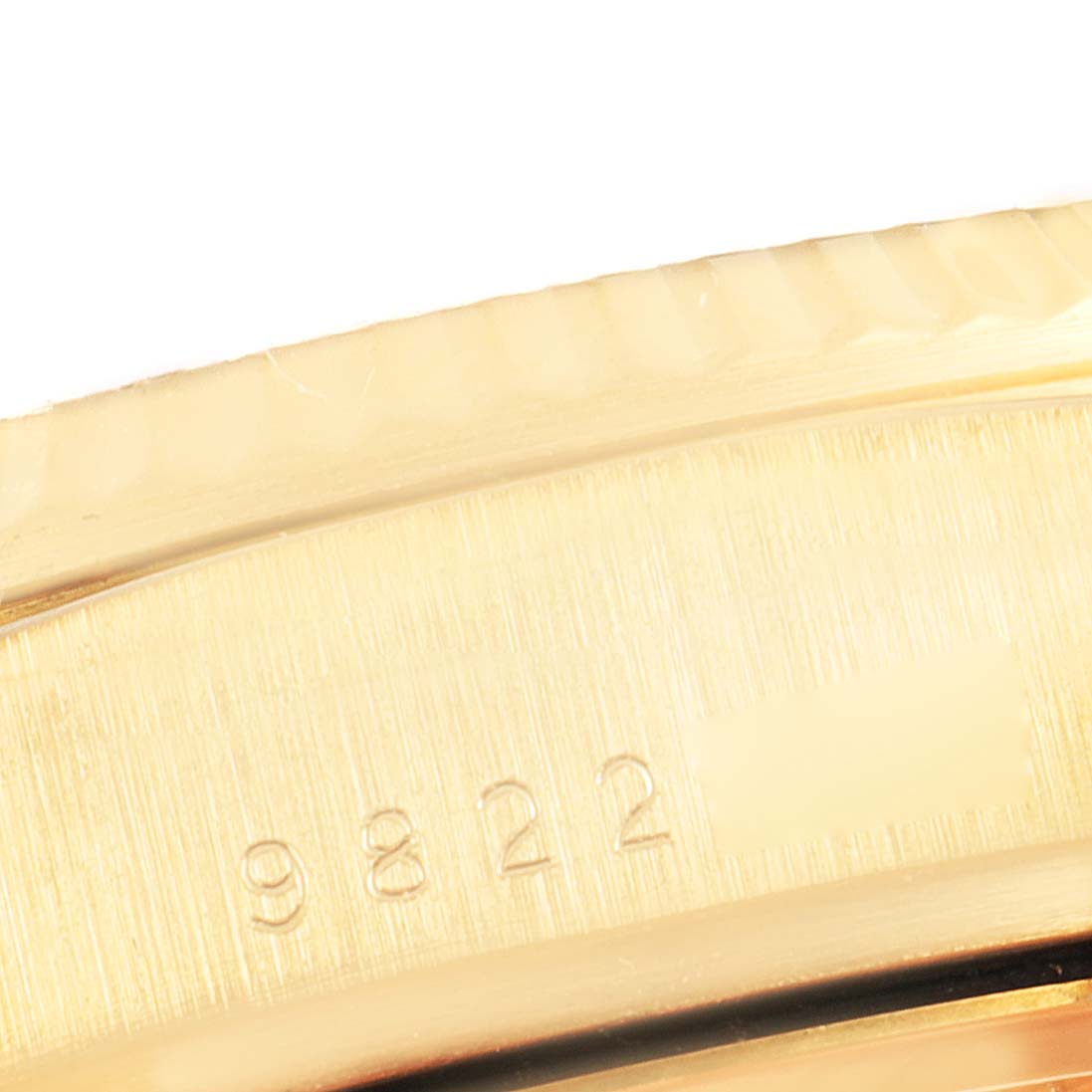 This close-up image shows the engraved case back of a Rolex President 18038 Men's Yellow Gold Champagne Dial 18038 Men's Yellow Gold Champagne Dial model watch.