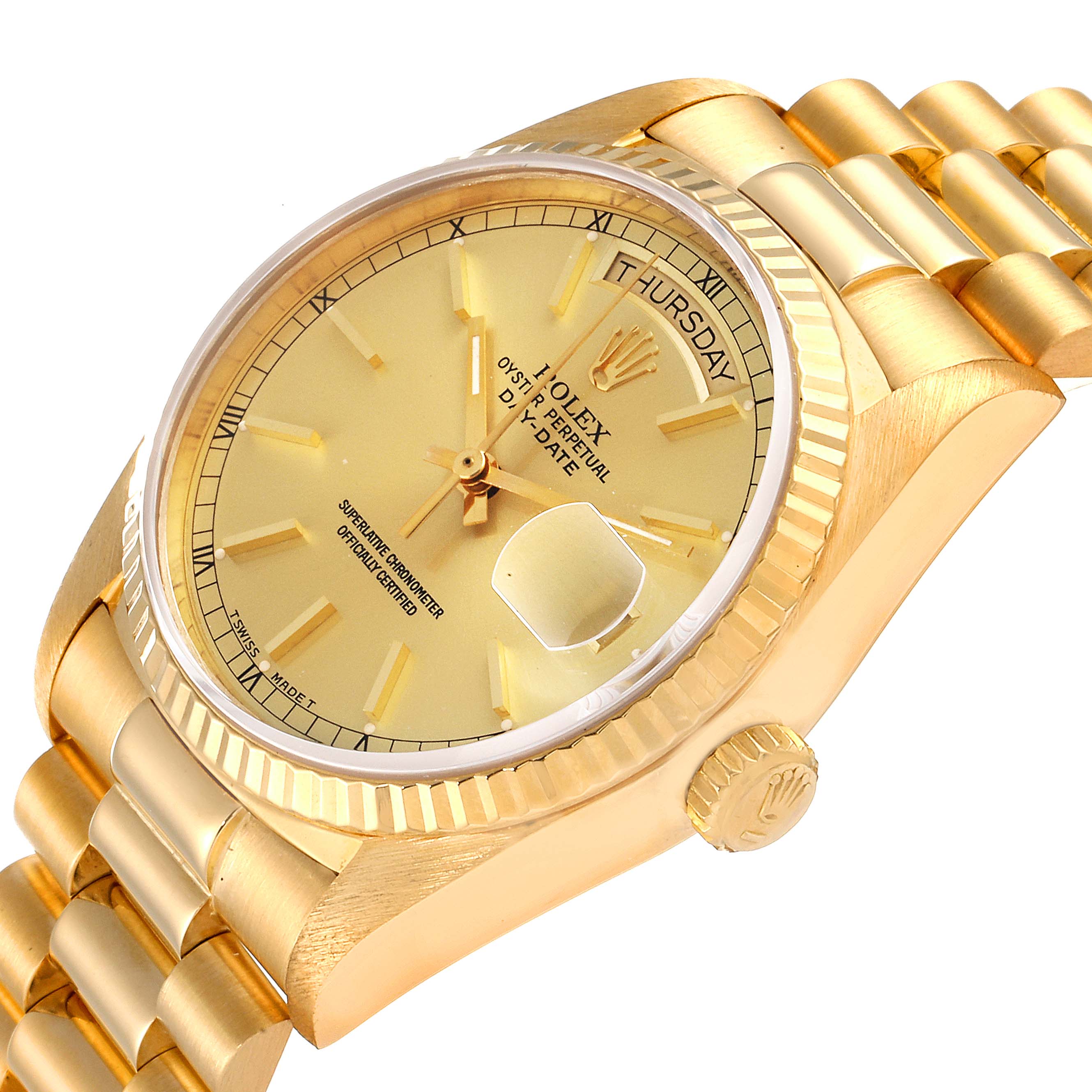 This image shows the face, crown, and part of the bracelet of a Rolex President 18038 Men's Yellow Gold Champagne Dial 18038 Men's Yellow Gold Champagne Dial model watch at an angle.