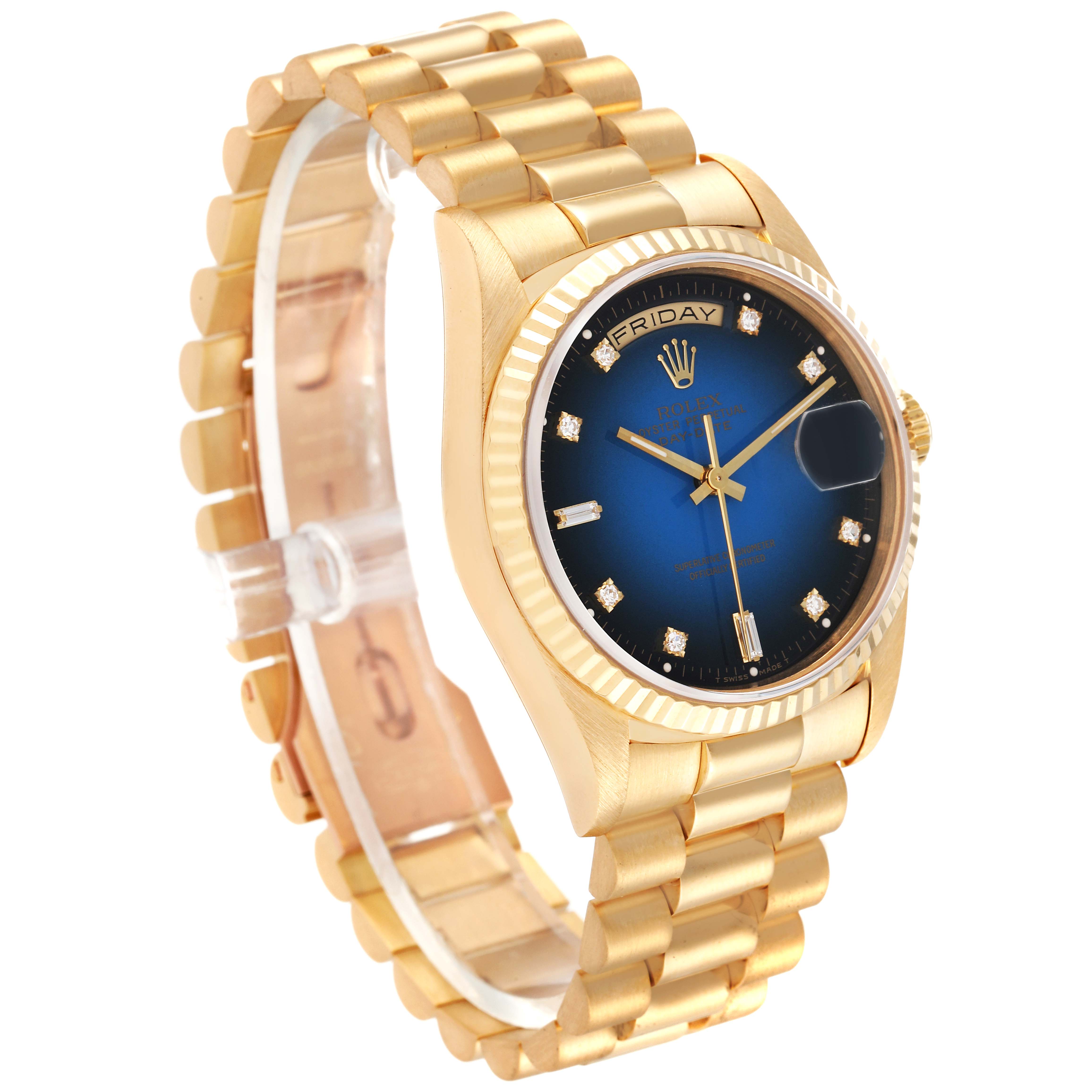 The image shows a Rolex President 18238 Men
s Yellow Gold Blue Dial 18238 Men
s Yellow Gold Blue Dial model watch at a three-quarter angle, highlighting its gold bracelet, blue dial, and fluted bezel.