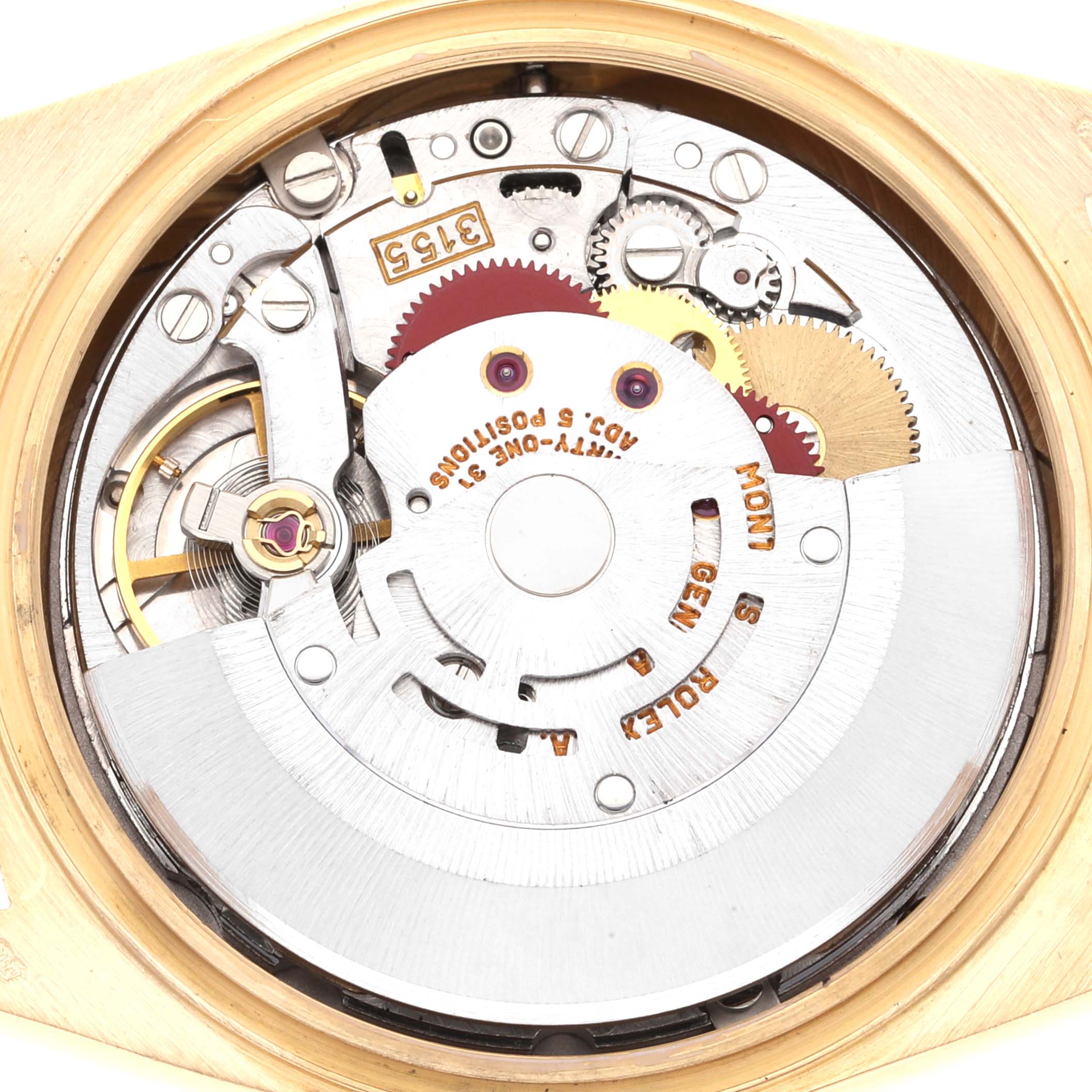 The image shows the close-up view of the internal mechanism of a Rolex President 18238 Men
s Yellow Gold Blue Dial 18238 Men
s Yellow Gold Blue Dial model watch.