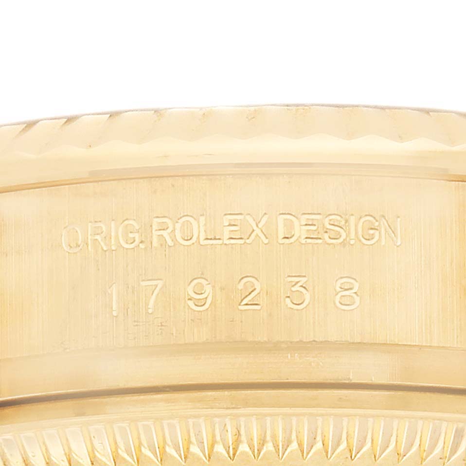 The image shows an engraved side view of a Rolex President 179238 Women's Yellow Gold Champagne Dial model's case, highlighting the original design and model number.