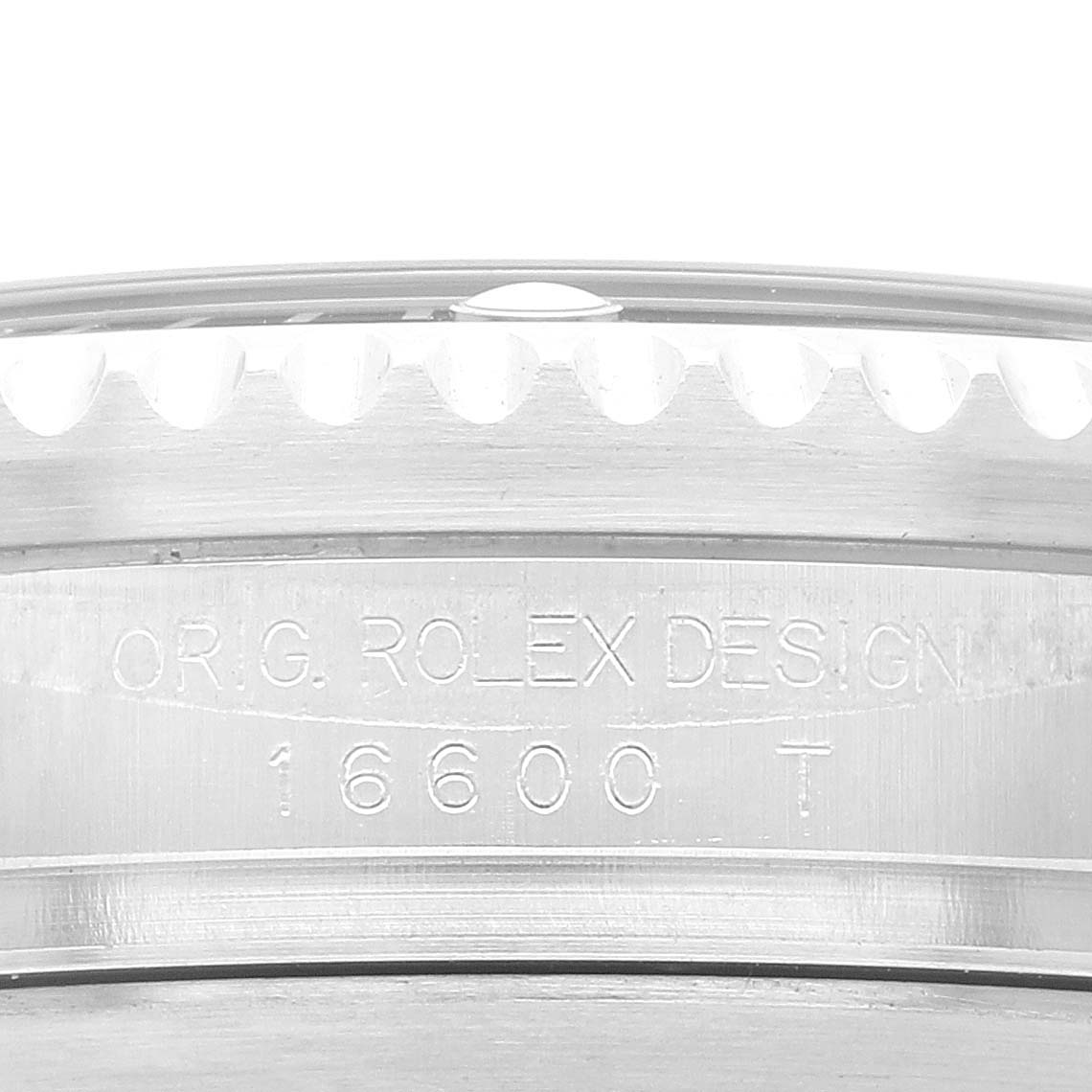 This image shows a close-up of the case back of a Rolex Sea-Dweller 16600T Men's Stainless Steel Black Dial 16600T Men's Stainless Steel Black Dial with model number 16600 engraved.