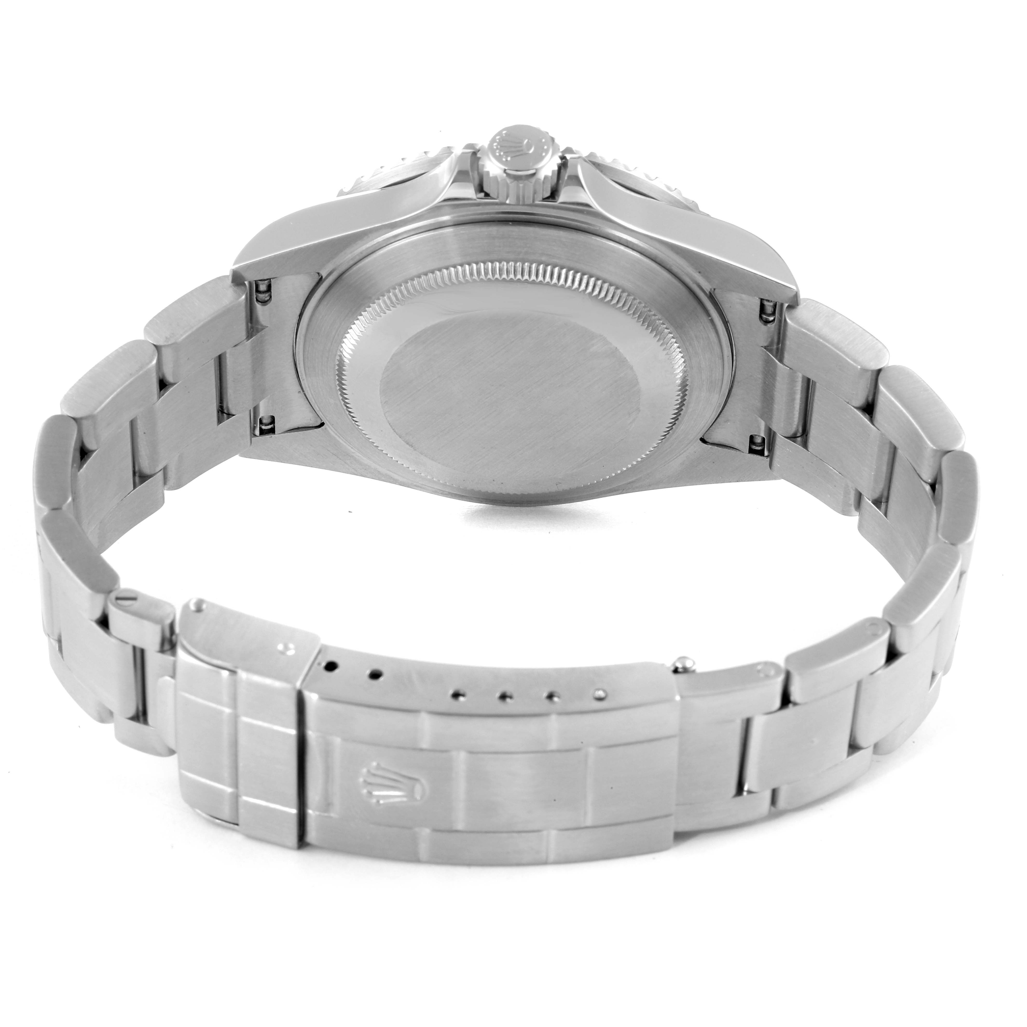 This image shows the back view of a Rolex Submariner 16610 Men
s Stainless Steel Black Dial 16610 Men
s Stainless Steel Black Dial watch, highlighting its case back, bracelet, and clasp.