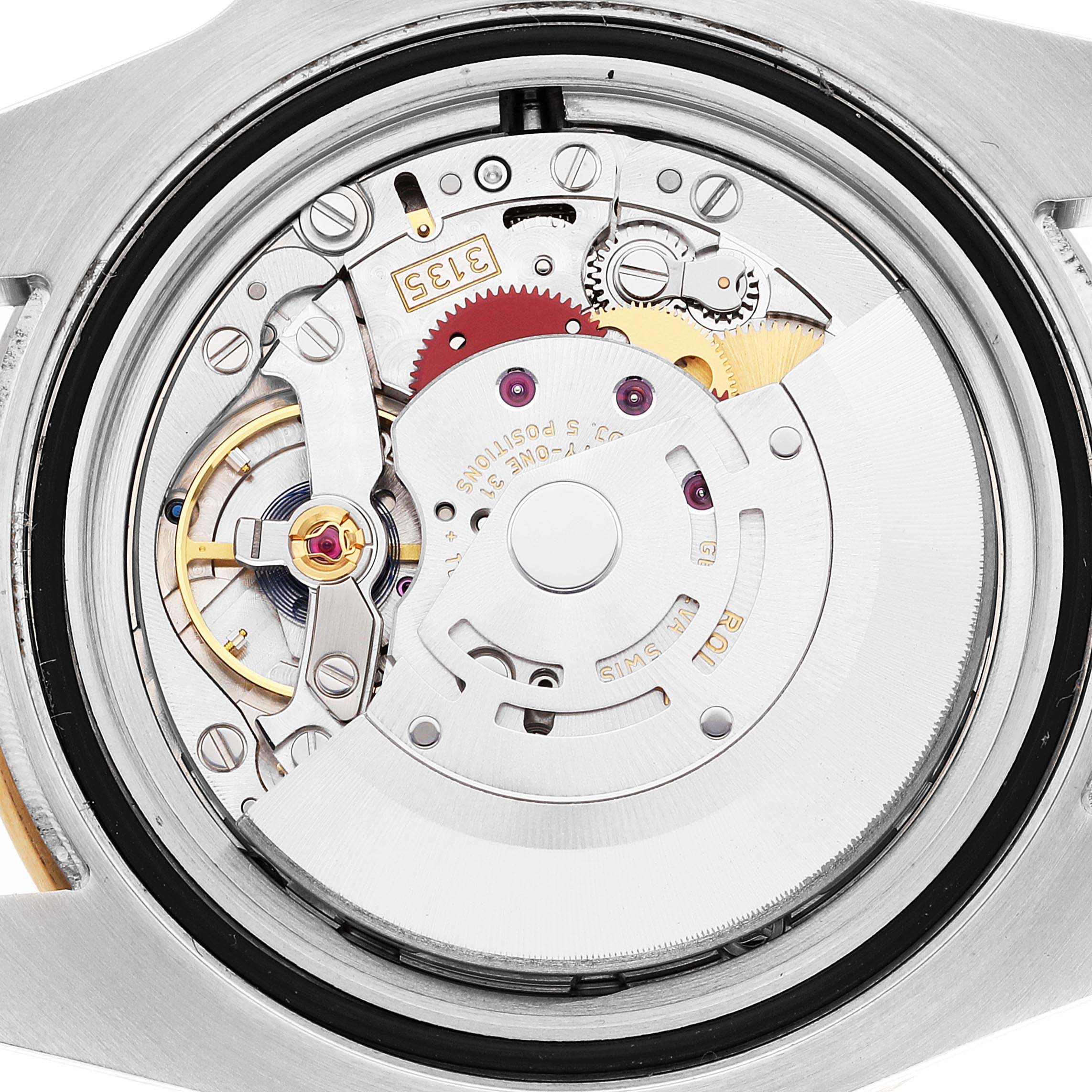 The image shows a close-up view of the inner mechanical movement of a Rolex Submariner 116613 Men's Steel and Gold (two tone) Black Dial 116613 Men's Steel and Gold (two tone) Black Dial watch.