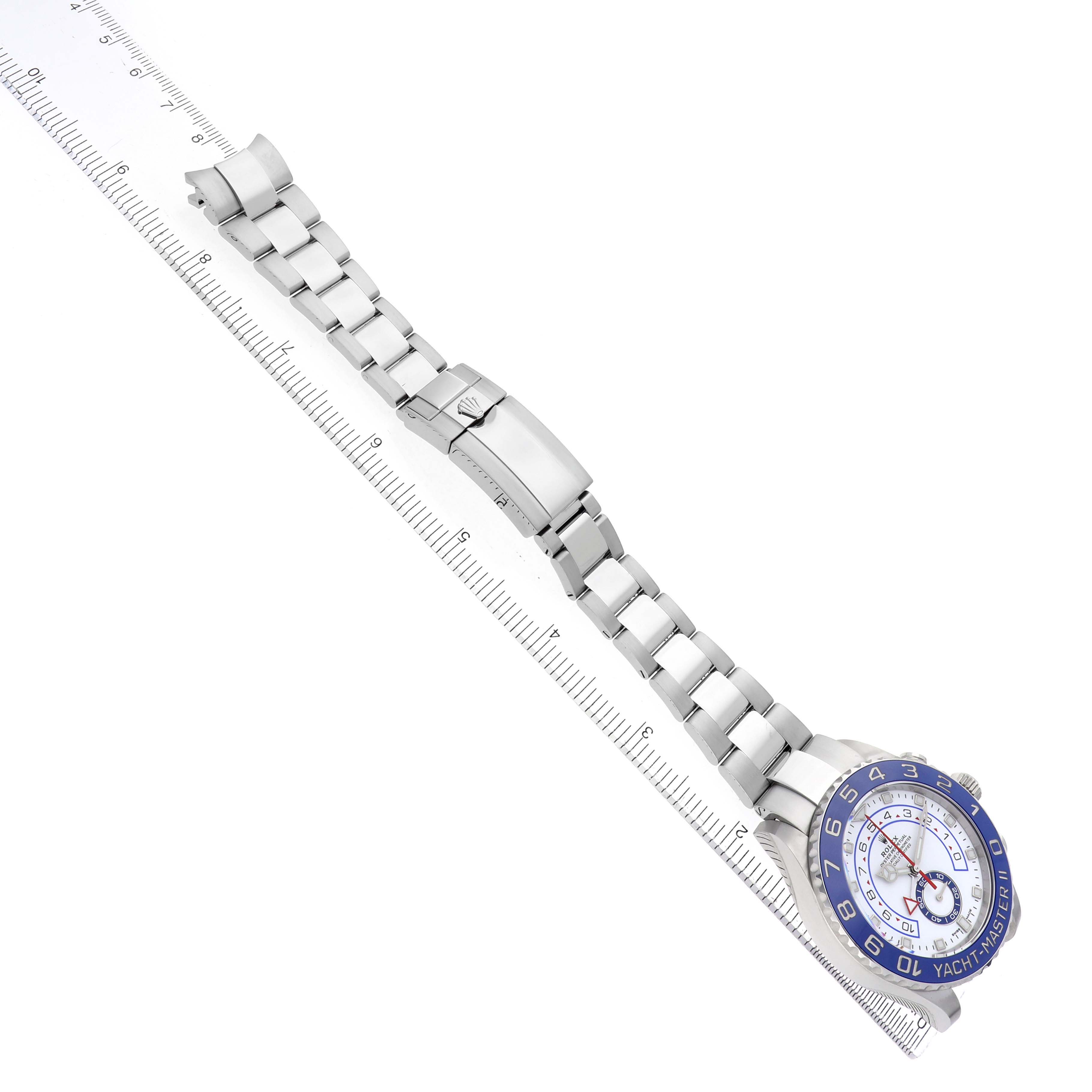 The Rolex Yacht-Master 116680 Men's Stainless Steel White Dial watch is shown at an angled view with its band extended, displaying the dial, bezel, and clasp.