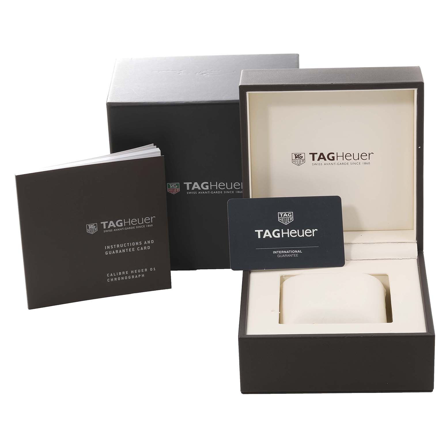 The image shows a Tag Heuer Carrera CAR2A91 Men's Ceramic Black Dial CAR2A91 Men's Ceramic Black Dial watch box, international guarantee card, and instruction booklet from a front angle.