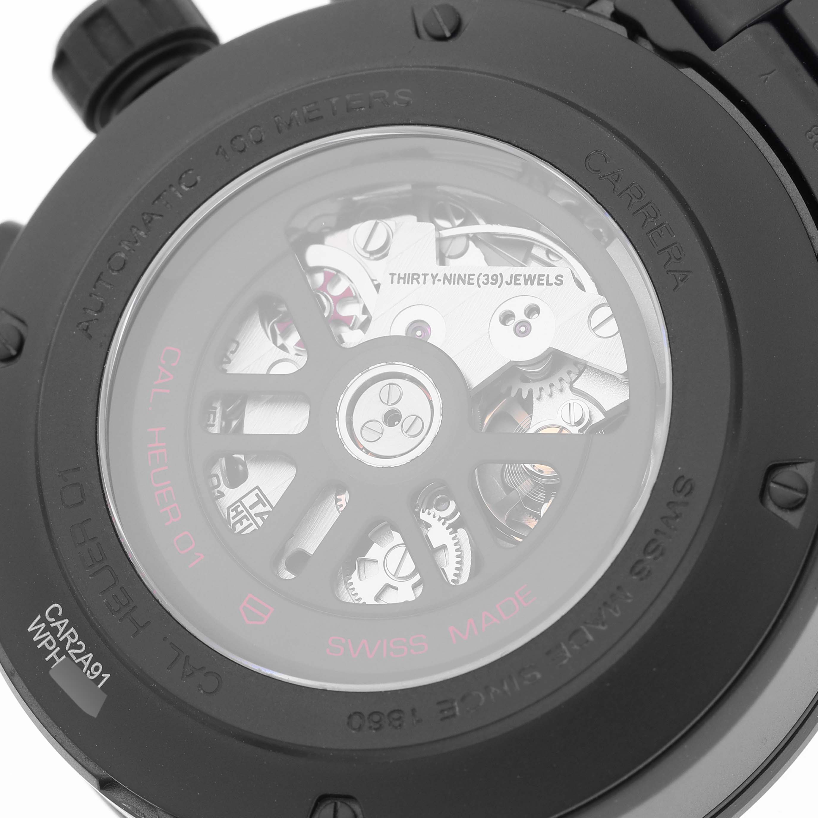 The image shows the back of a Tag Heuer Carrera CAR2A91 Men's Ceramic Black Dial CAR2A91 Men's Ceramic Black Dial watch, highlighting its automatic movement and visible internal mechanics.