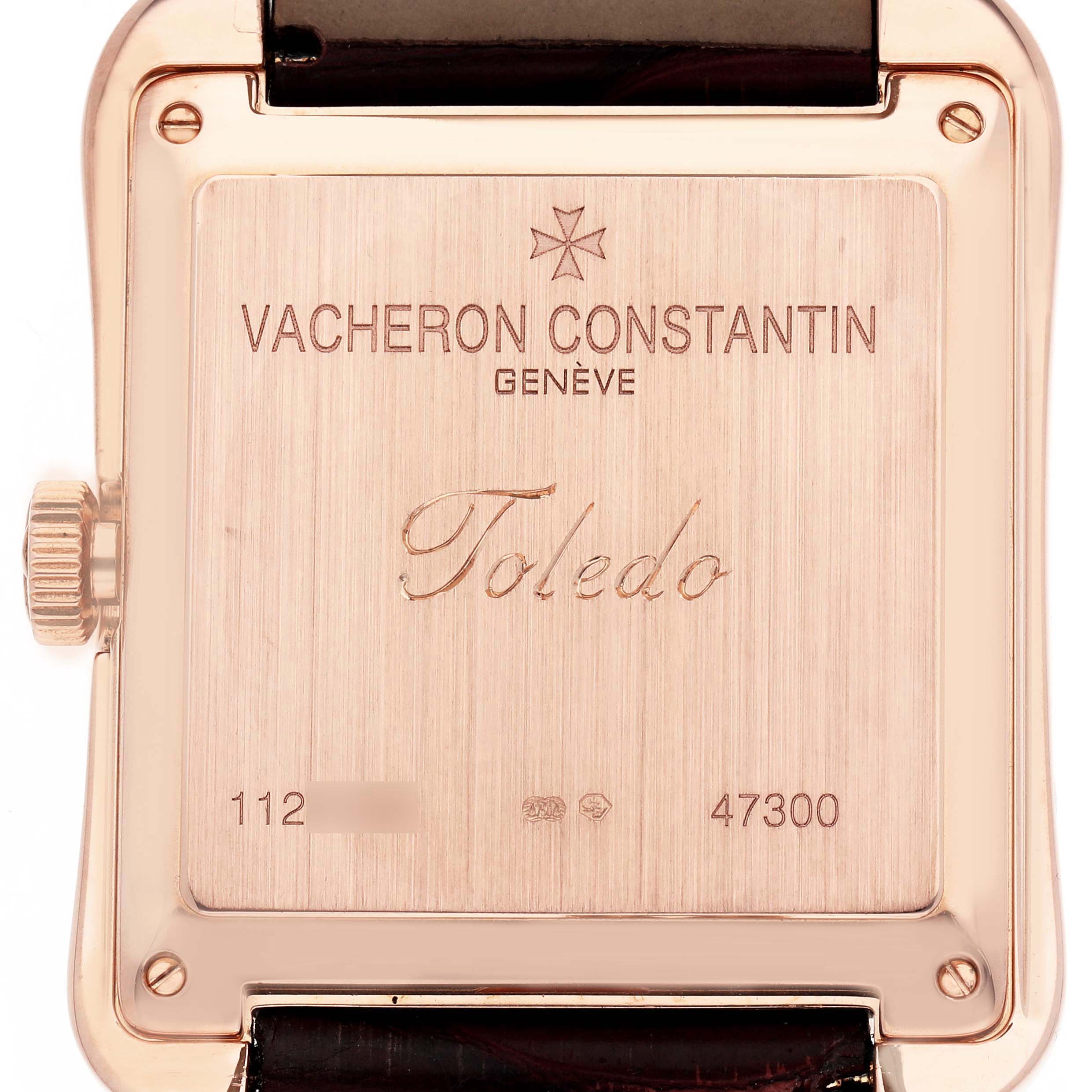 The image shows the back of a Vacheron Constantin Historiques 47300/000R Men's Rose Gold Silver Dial Toledo watch, displaying branding and model details.