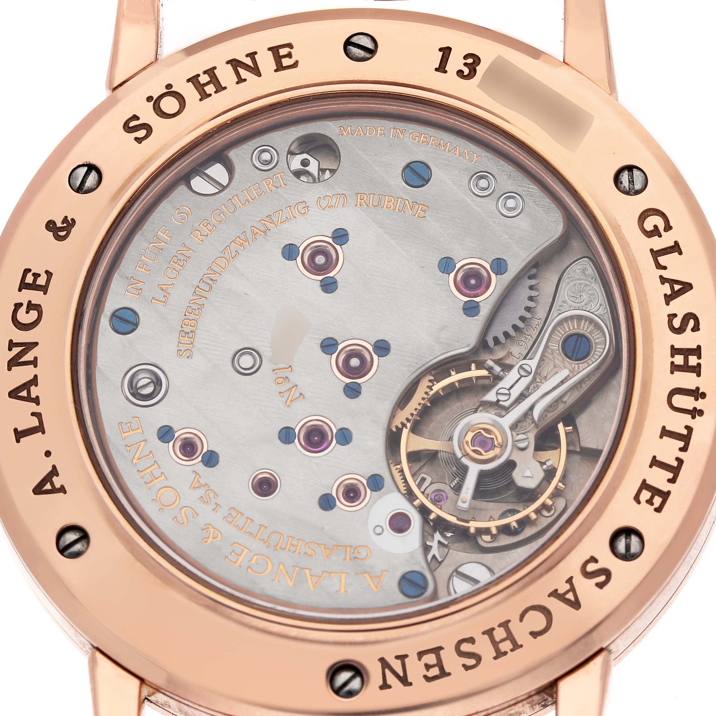The image shows the back view of the A. Lange 
Sohne 1815 221.032 / LSLS2214AD Men
s Rose Gold Silver Dial model, showcasing its intricate internal mechanisms.