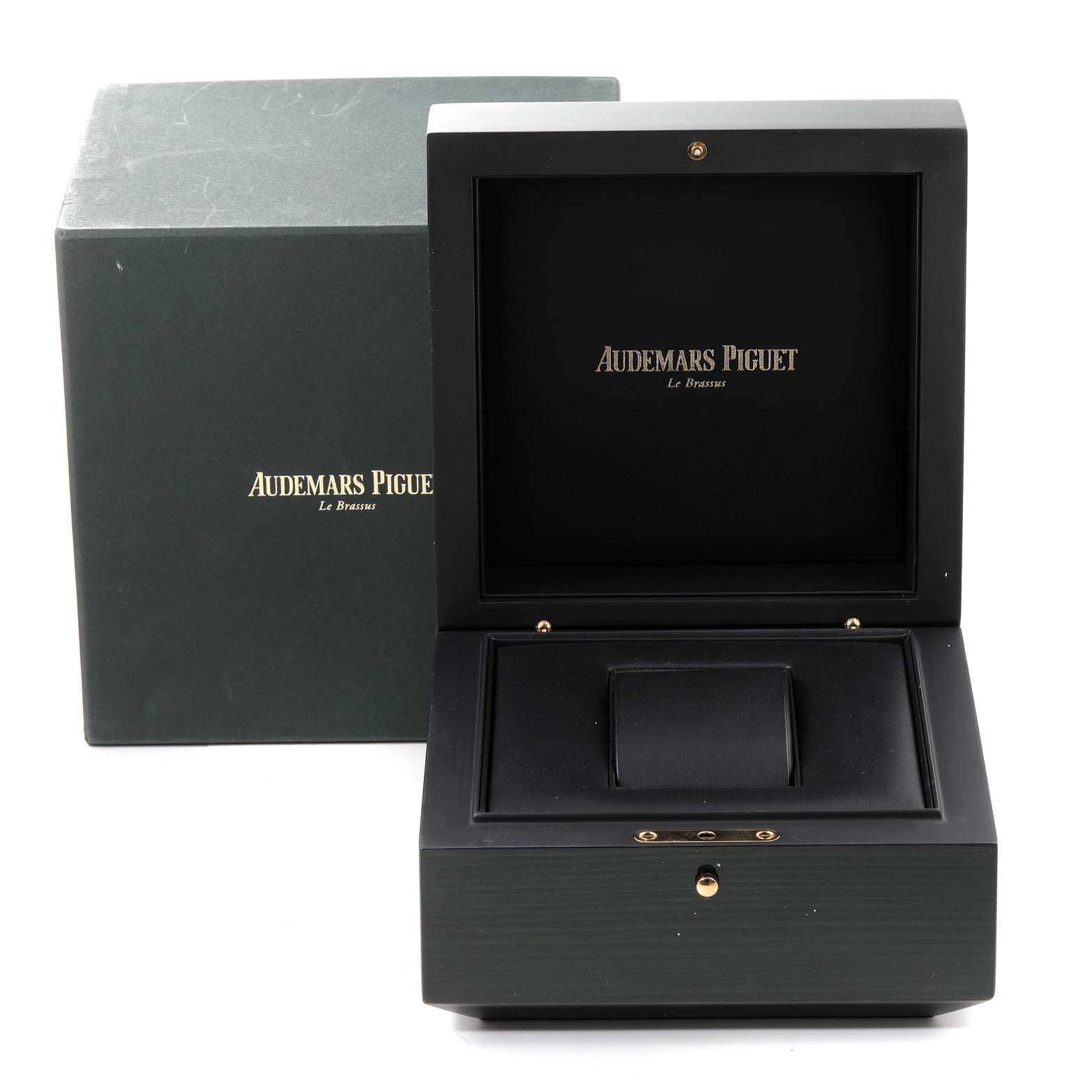 The image shows the open box and external packaging for a Royal Oak Offshore model by Audemars Piguet.