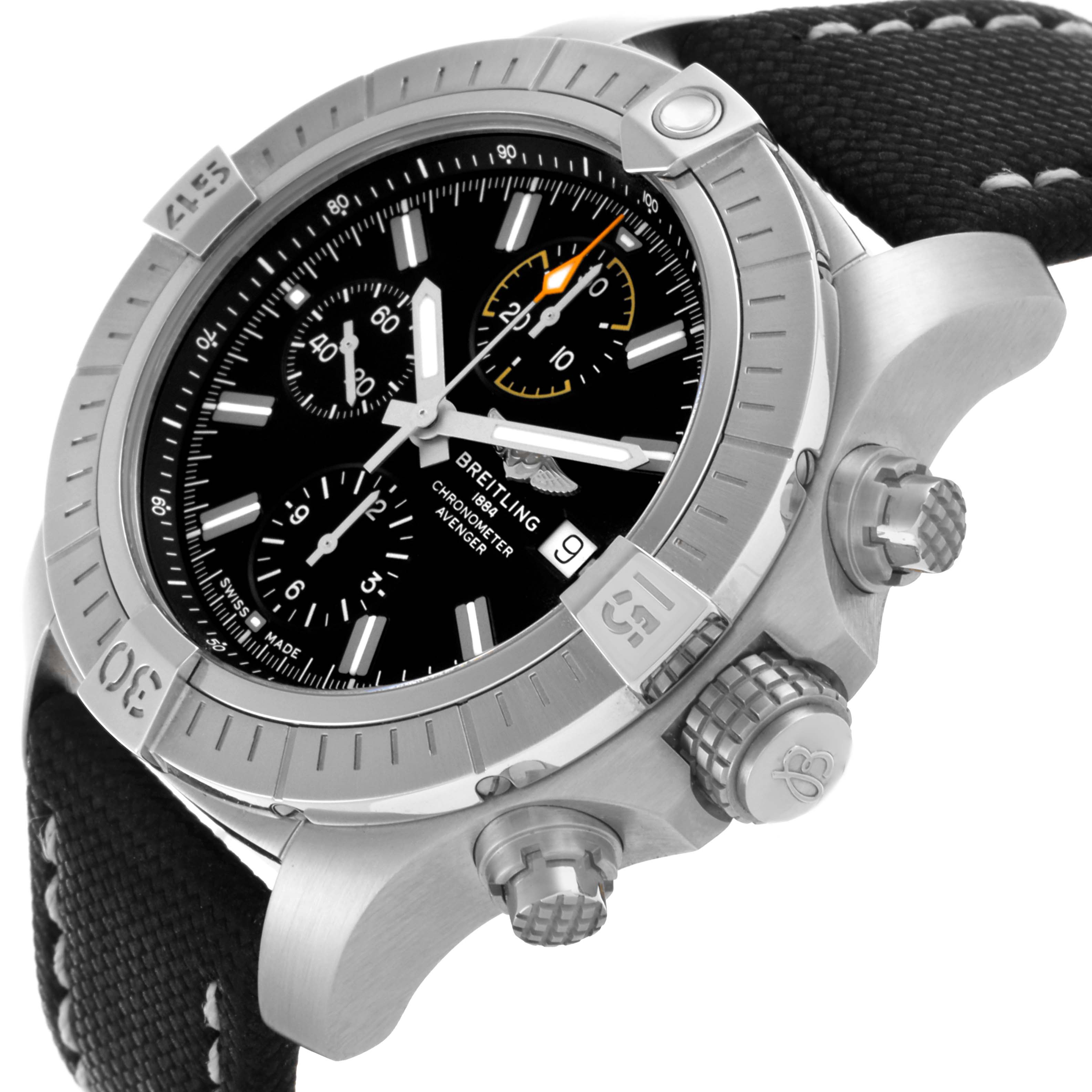 The Breitling Avenger A13317 Men's Stainless Steel Black Dial A13317 Men's Stainless Steel Black Dial watch is shown at an angle highlighting the bezel, crown, pushers, black dial, and fabric strap.