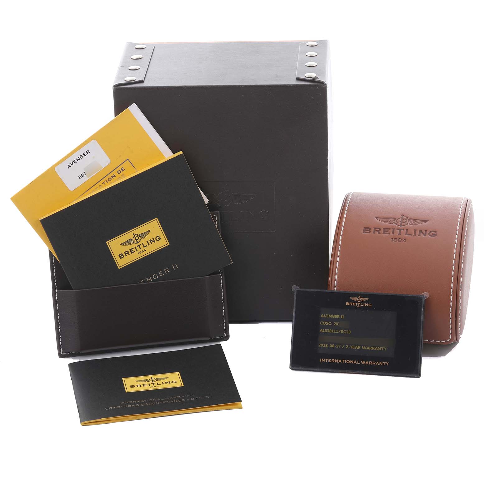 The image shows Breitling Avenger A13381 Men's Stainless Steel Black Dial A13381 Men's Stainless Steel Black Dial packaging, including a box, a leather case, manuals, and a warranty card.