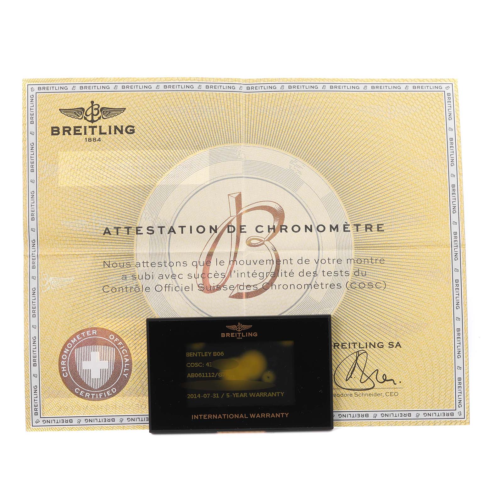 The image shows the Breitling Bentley AB061112/G768-990A Men's Stainless Steel Silver Dial warranty certificate and international warranty card from an overhead angle.