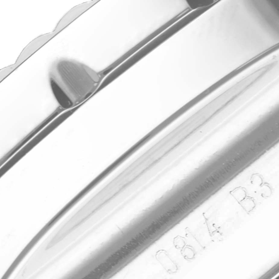 The image shows a close-up of the side and engraved details on a Breitling Bentley AB061112/G768-990A Men's Stainless Steel Silver Dial watch case.