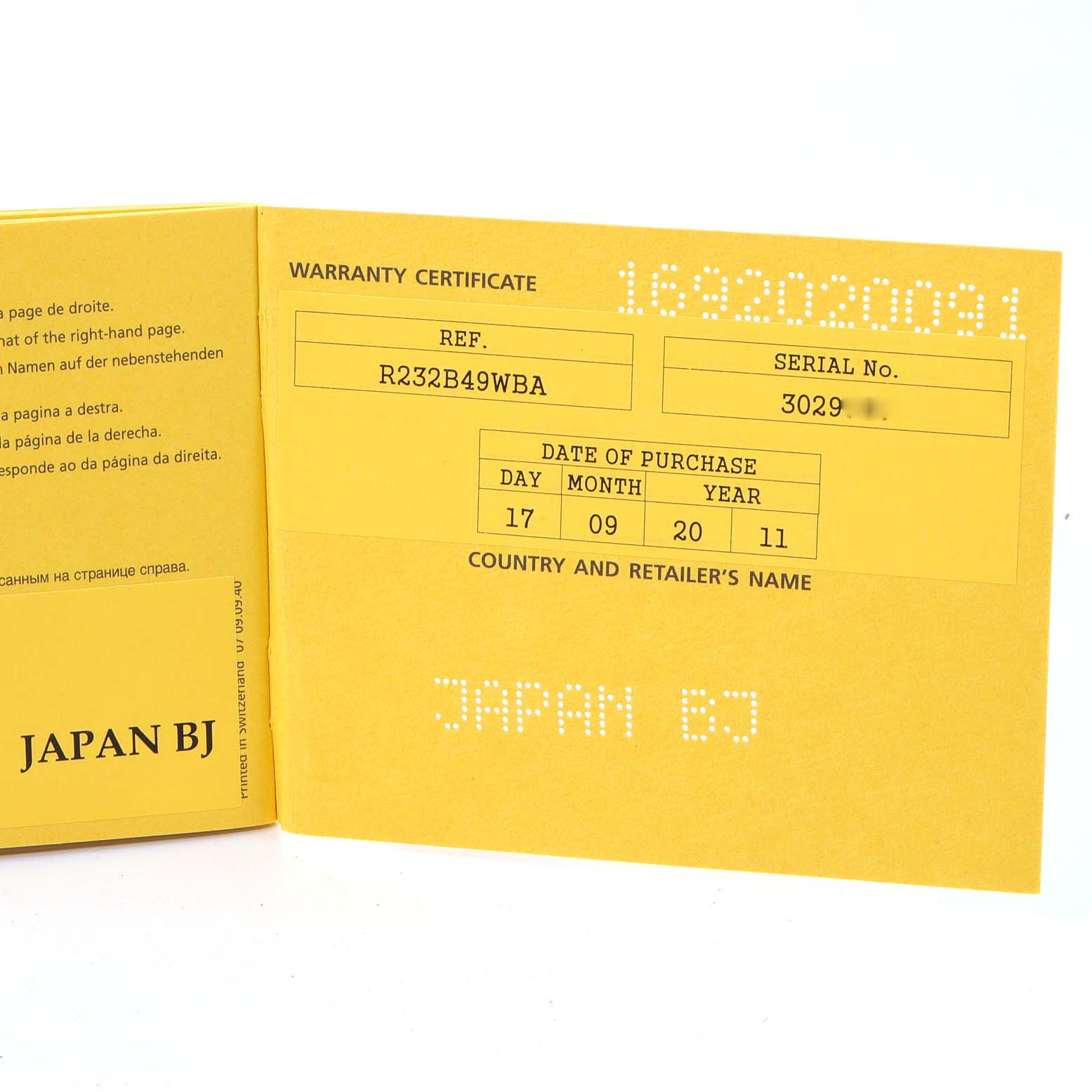 The image shows a yellow warranty certificate for a Breitling Navitimer RB0121 Men's Rose Gold Black Dial RB0121 Men's Rose Gold Black Dial watch, detailing the purchase date, reference, and serial number.