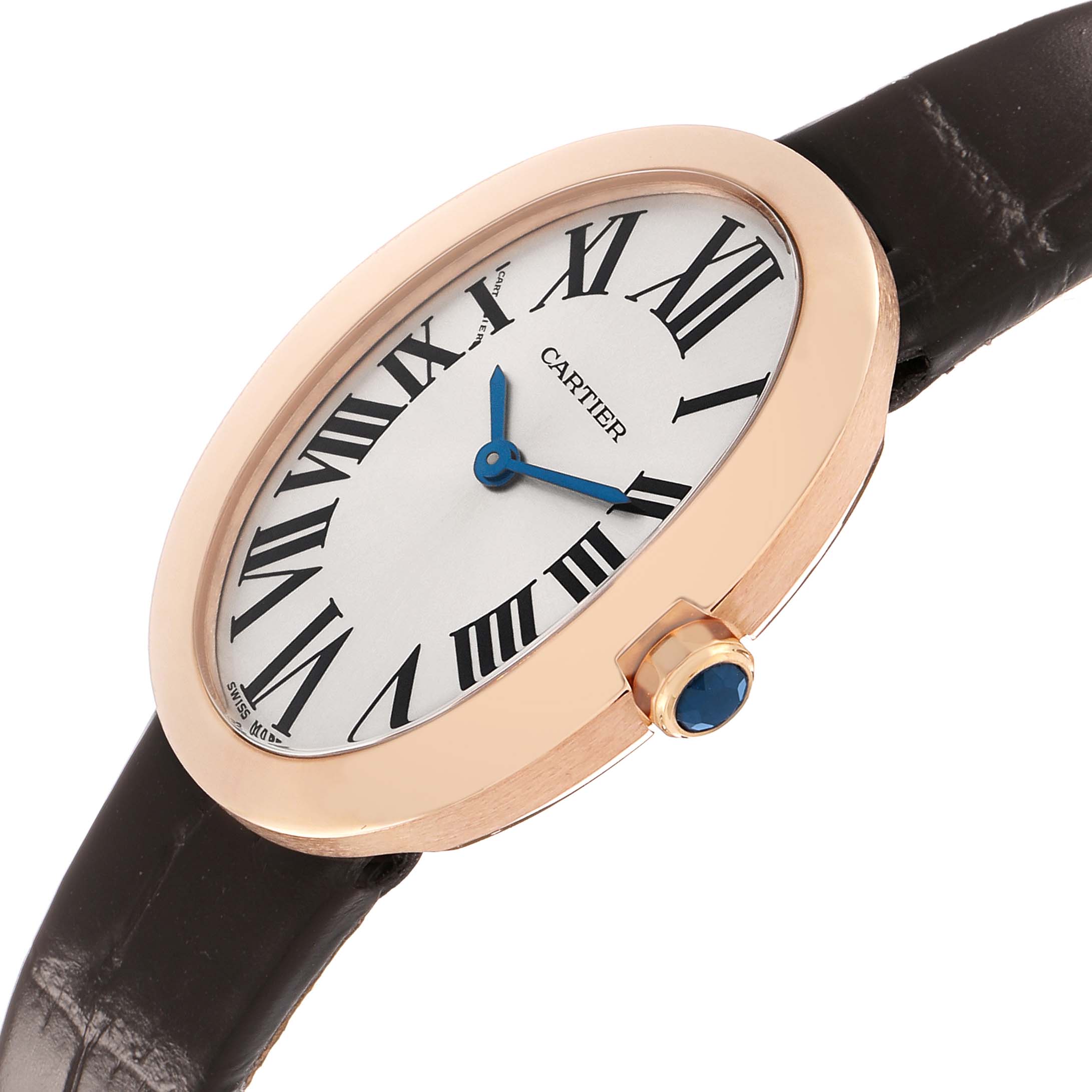 The Cartier Baignoire W8000007 Women's Rose Gold Silver Dial watch is shown from a slightly angled side view, featuring the oval case, Roman numerals, and the crown with a blue gem.