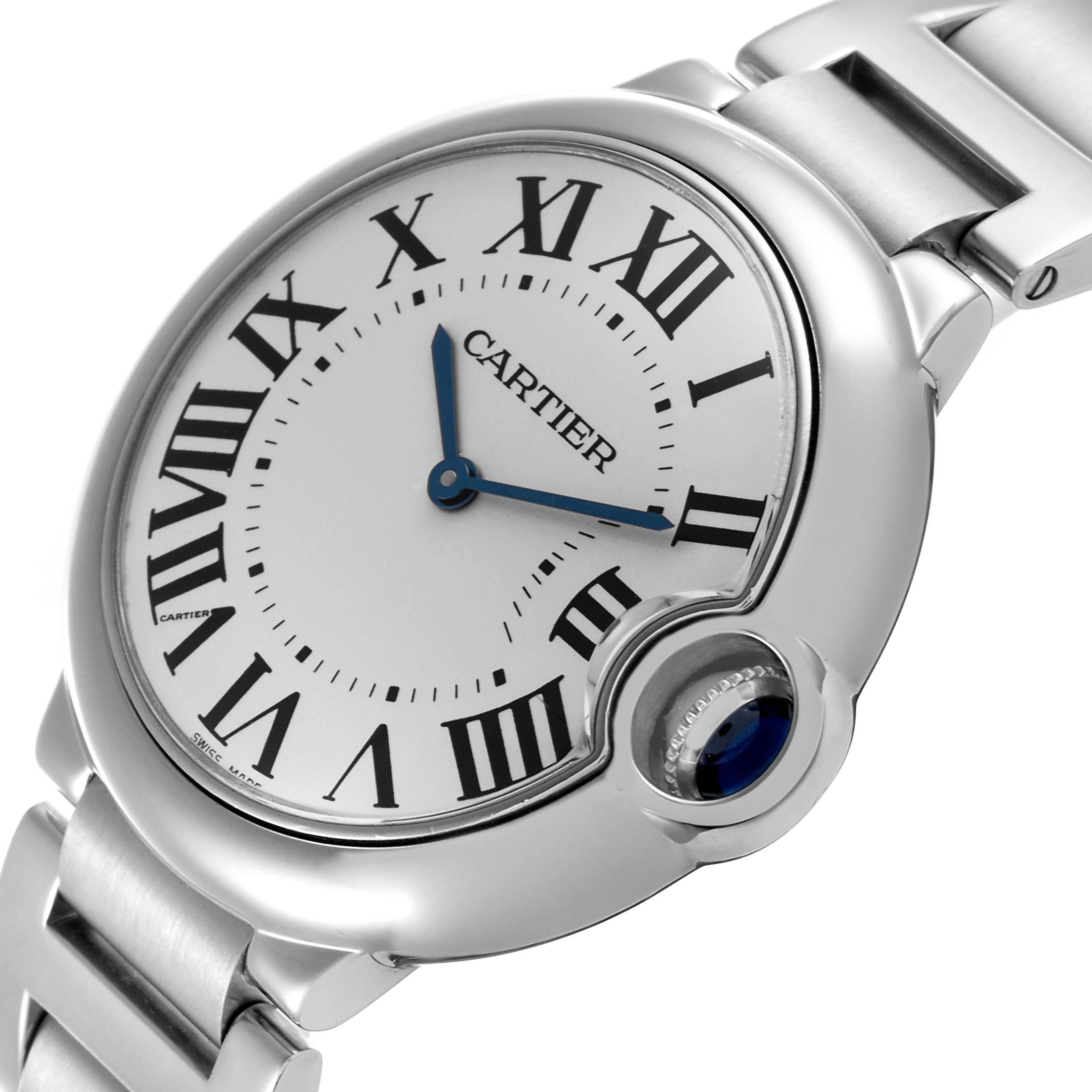 The Ballon Bleu de Cartier watch is shown at an angled side view, highlighting the dial, case, bracelet, and crown.