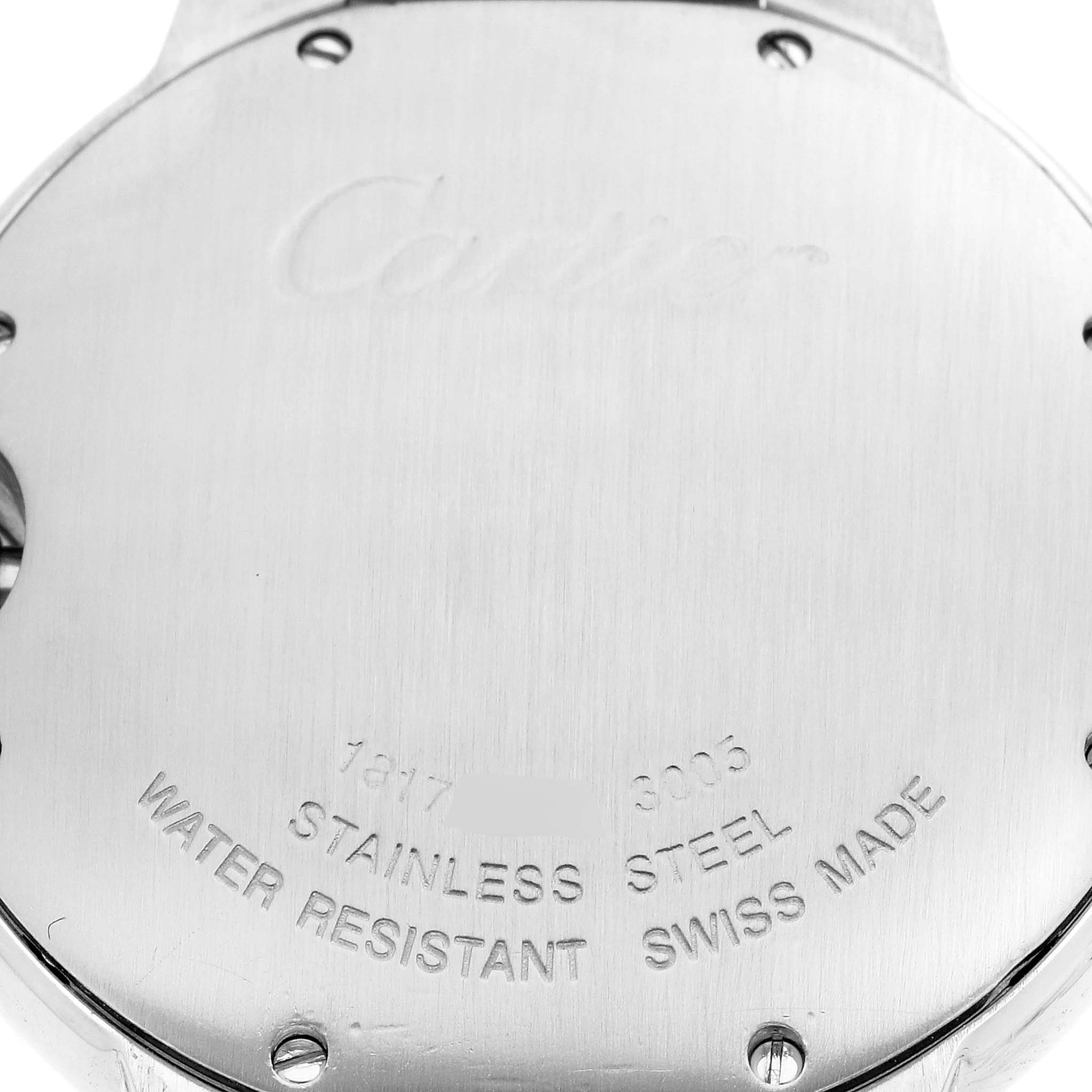 The image shows the back case of the Cartier Ballon Bleu W69011Z4 Men
s Stainless Steel Silver Dial W69011Z4 Men
s Stainless Steel Silver Dial watch, focusing on its engravings and screws.