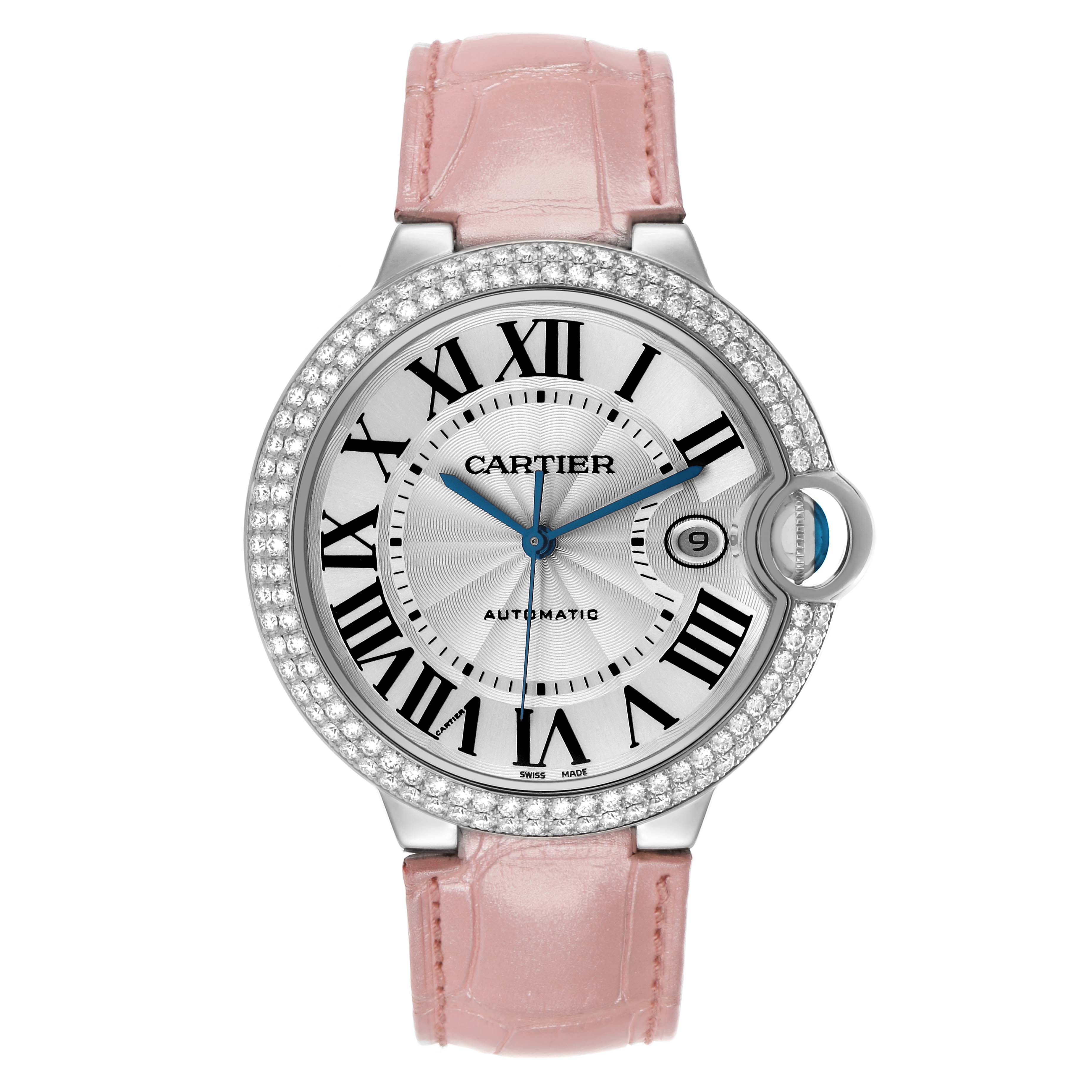 The Cartier Ballon Bleu WJBB0032 Men's White Gold Silver Dial watch is shown from a top view, highlighting its face, pink strap, and diamond bezel.