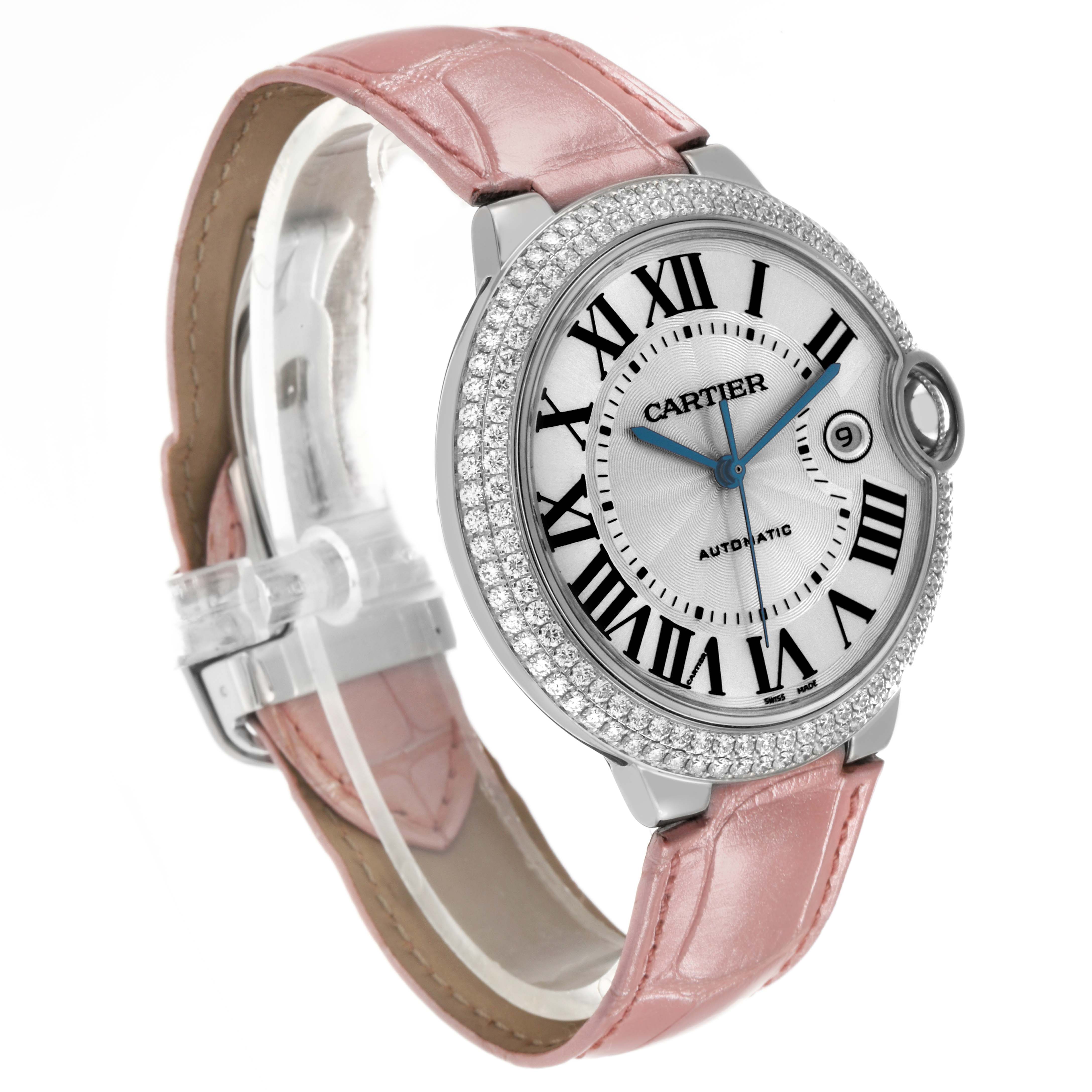 The Cartier Ballon Bleu WJBB0032 Men's White Gold Silver Dial watch is shown at an angle highlighting its face, bezel with diamonds, and pink leather strap.