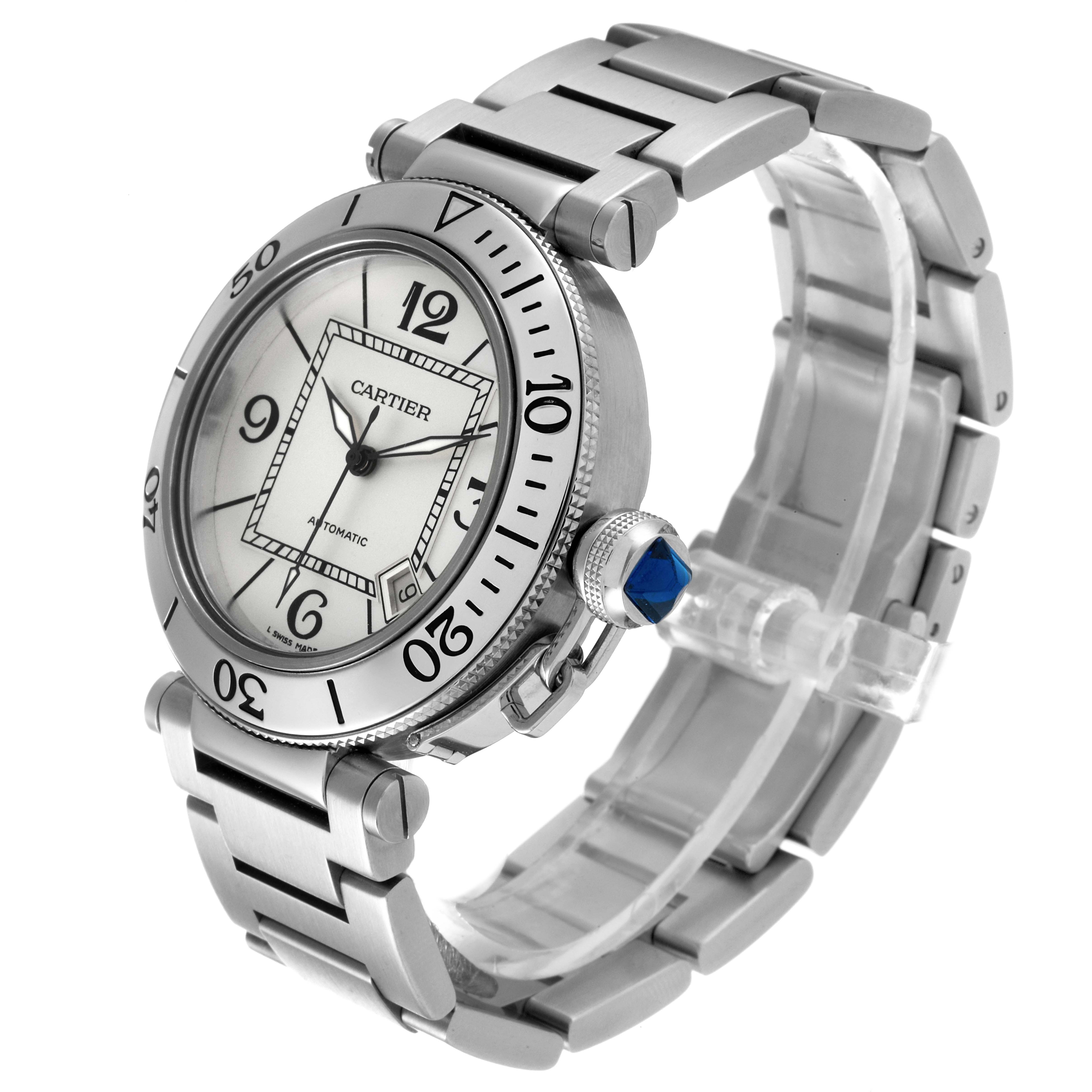The image shows a Cartier Pasha W31080M7 Men's Stainless Steel Silver Dial W31080M7 Men's Stainless Steel Silver Dial watch at a three-quarters angle, highlighting its face, bezel, crown, and metal bracelet.