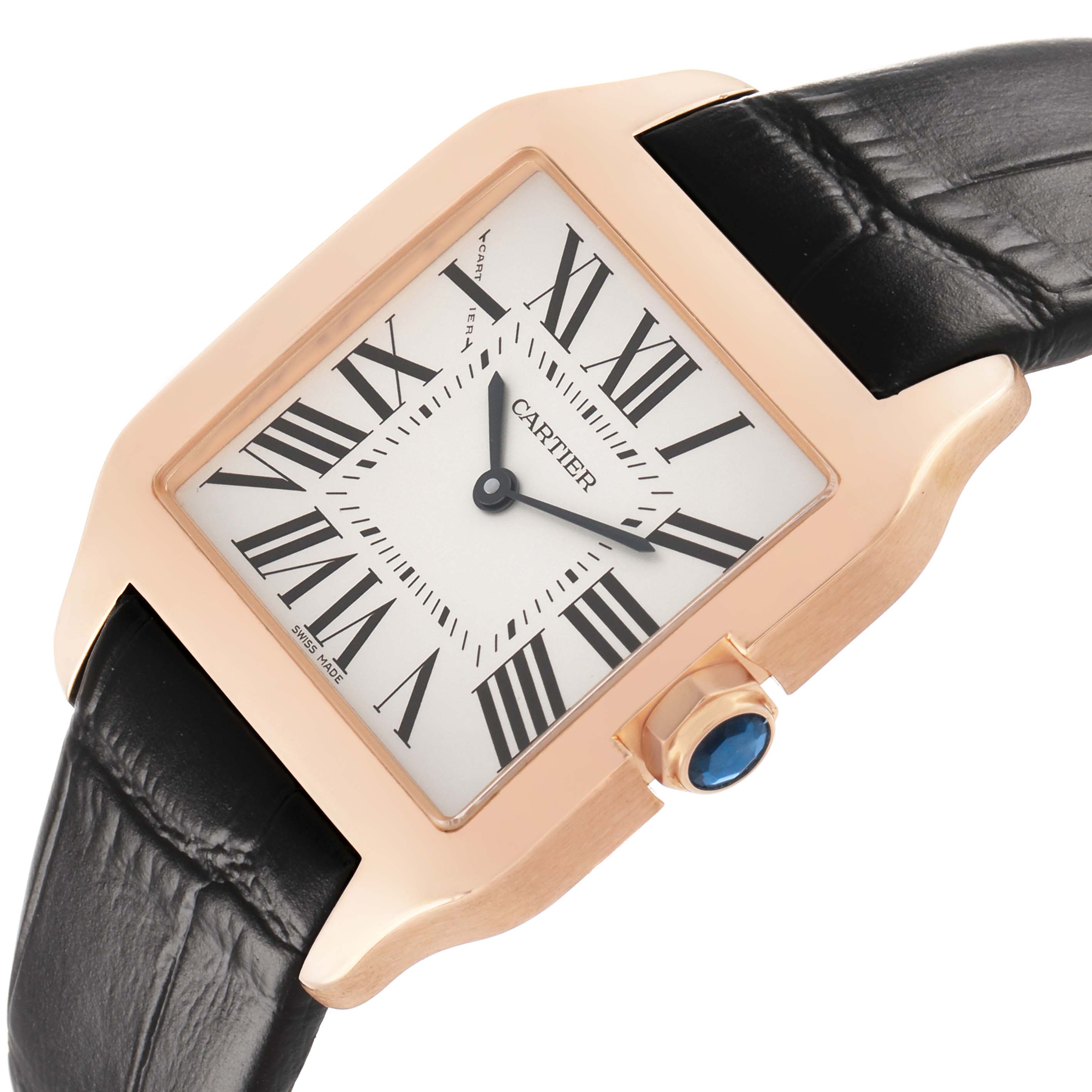 The Cartier Santos Dumont W2009251 Men's Rose Gold Silver Dial watch is shown at a tilted angle, highlighting its rectangular face, Roman numerals, and blue cabochon crown.