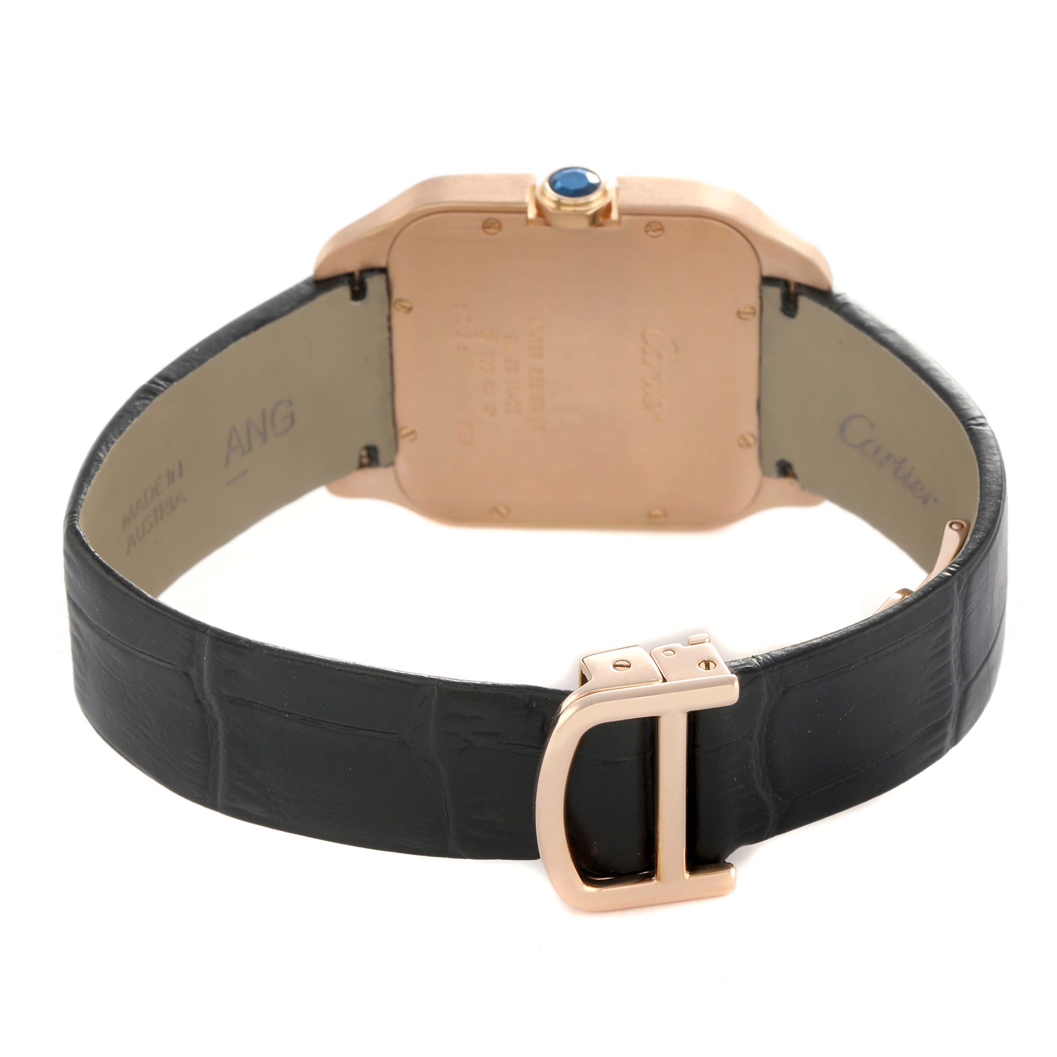 The Cartier Santos Dumont W2009251 Men's Rose Gold Silver Dial watch is shown from the back, focusing on the case back, strap, and clasp.