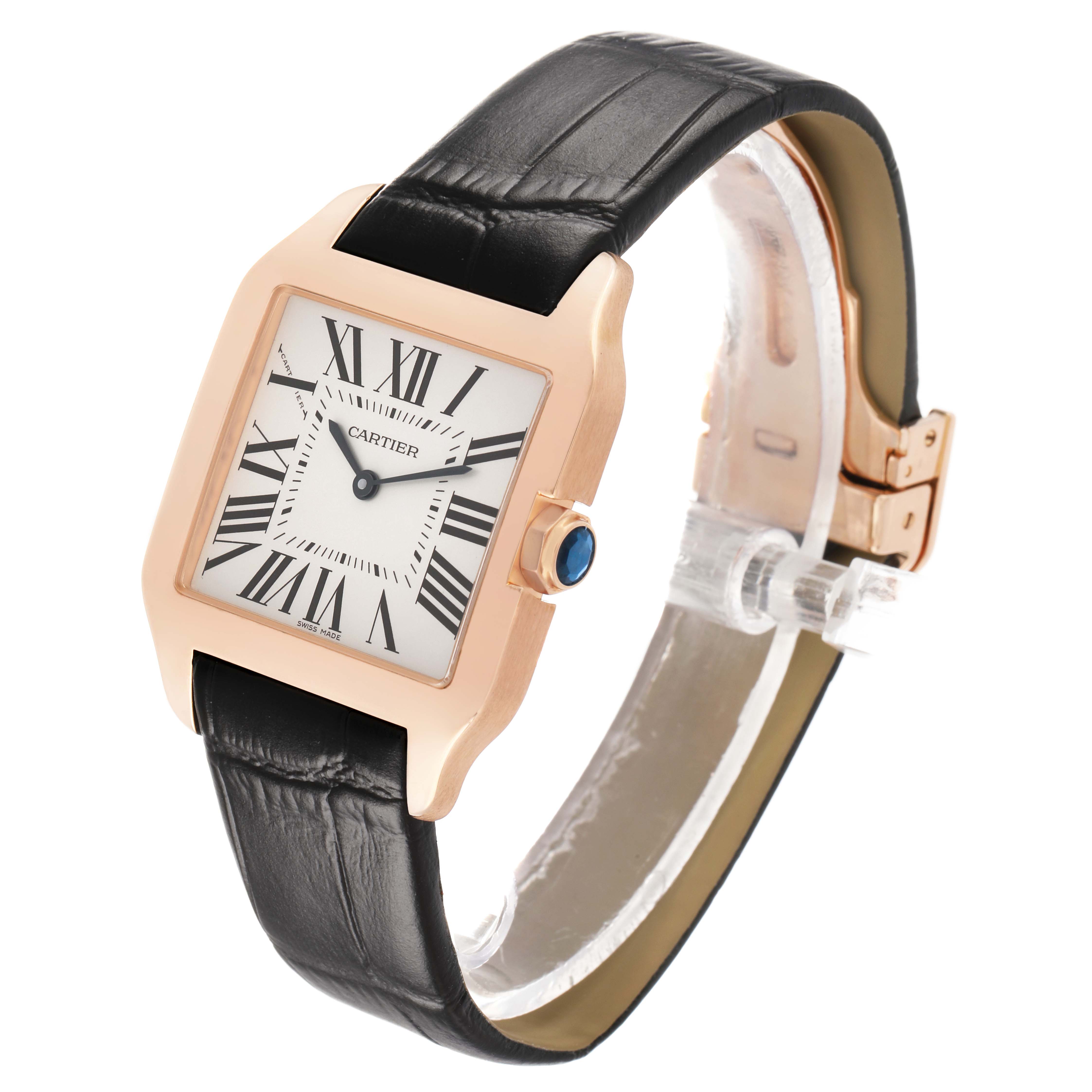 The Cartier Santos Dumont W2009251 Men's Rose Gold Silver Dial watch is shown at a three-quarter angle, highlighting the case, dial, black strap, and blue cabochon crown.