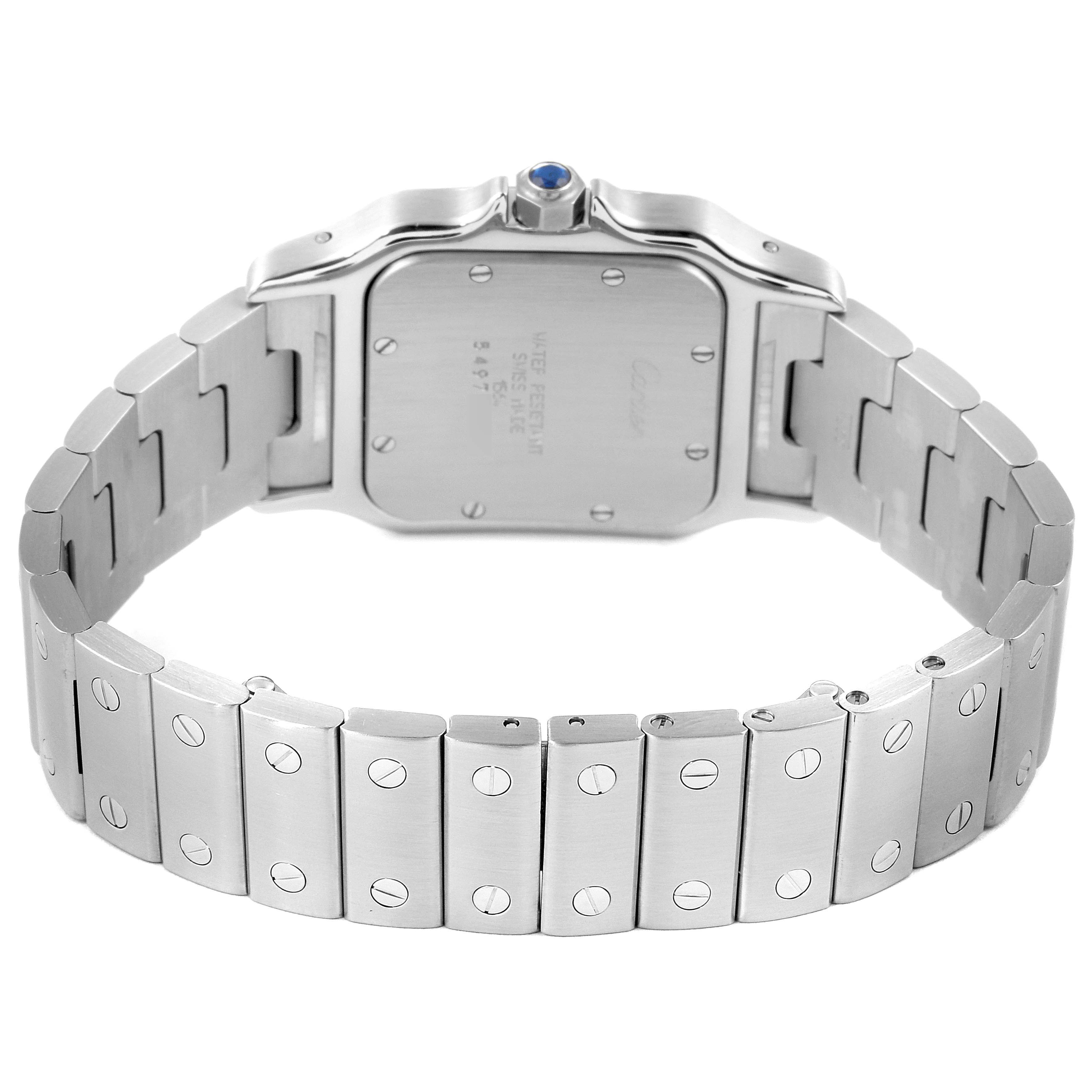 This image shows the back view of the Santos model by Cartier, highlighting the case back and stainless steel bracelet.