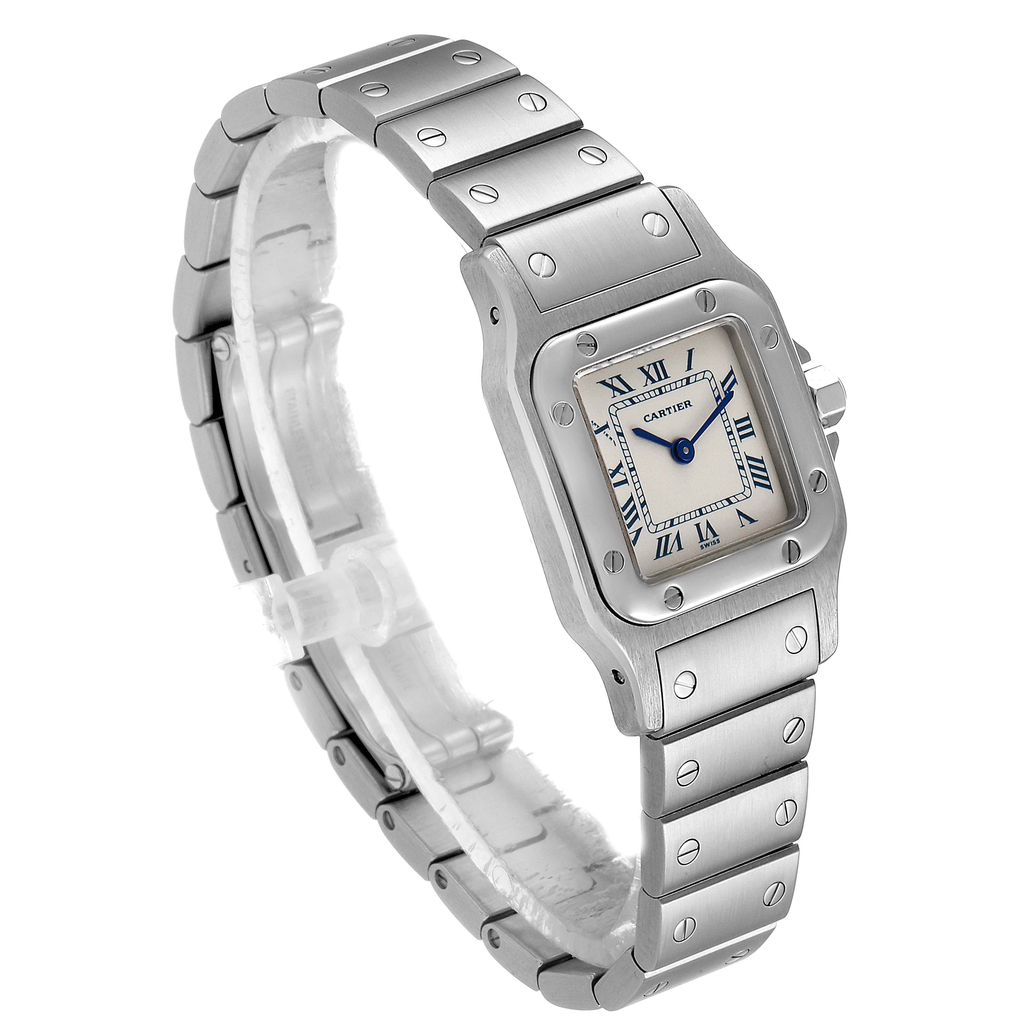 This Cartier Santos W20056D6 Women's Stainless Steel Silver Dial W20056D6 Women's Stainless Steel Silver Dial watch is shown at a three-quarter angle, highlighting its stainless steel case, bracelet, and square dial with Roman numerals.