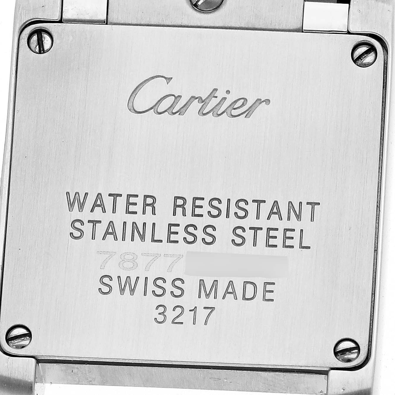 The image shows the case back of a Cartier Tank Française watch, highlighting its water resistance and stainless steel construction.