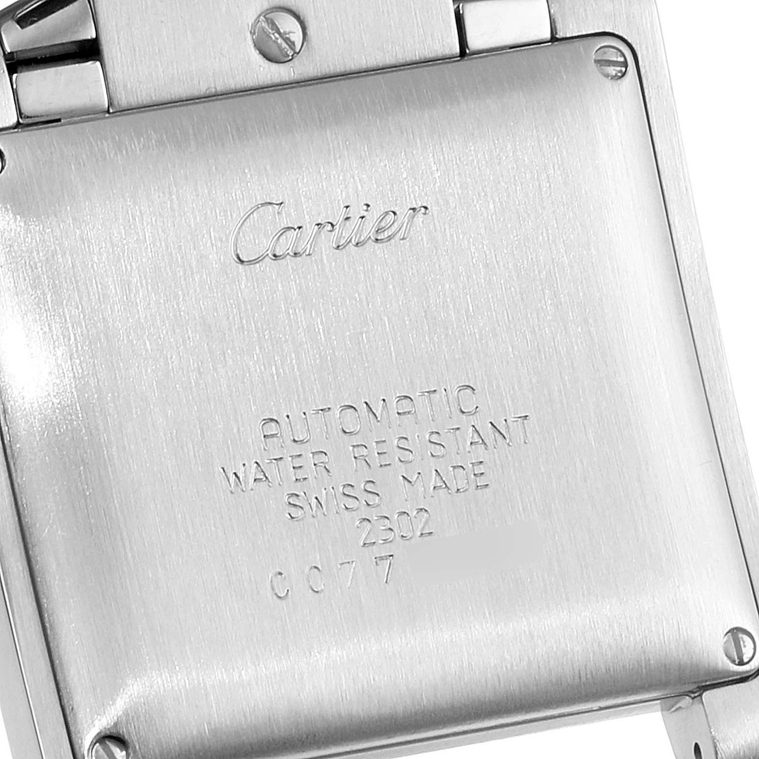 This is a close-up view of the back case of a Cartier Tank Francaise W51005Q4 Men's Steel and Gold (two tone) Silver Dial W51005Q4 Men's Steel and Gold (two tone) Silver Dial watch, showing the branding and specifications.
