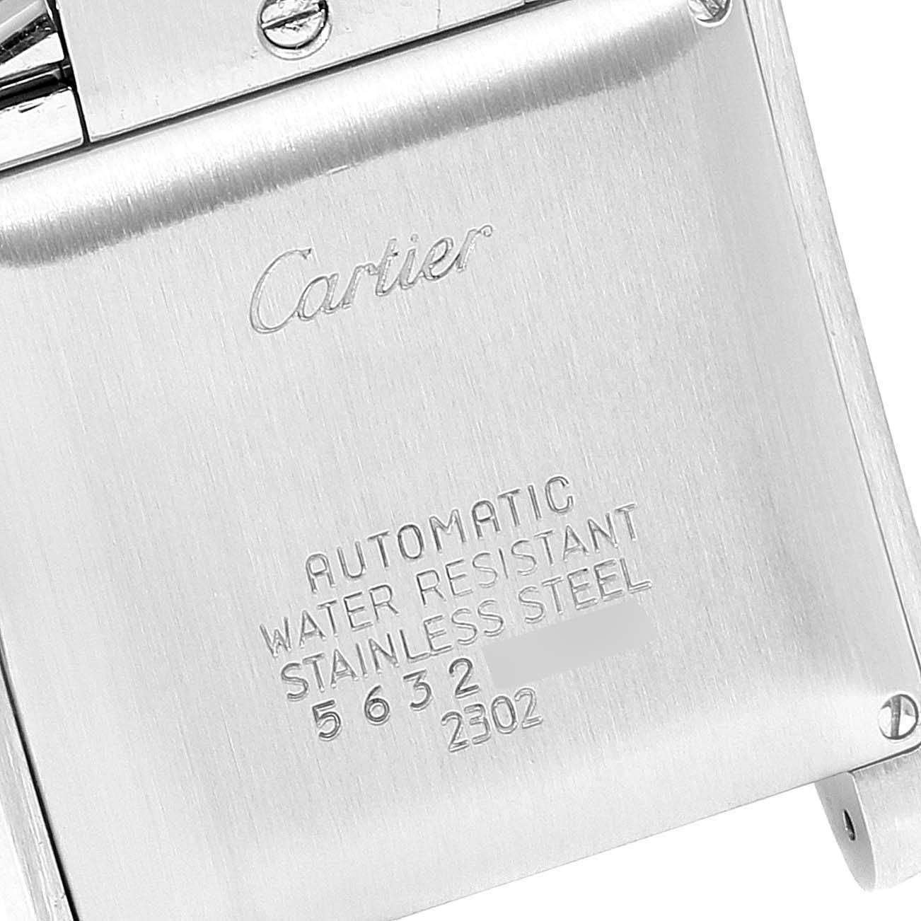 This image shows the backside of a Cartier Tank Francaise W51005Q4 Men's Steel and Gold (two tone) Silver Dial W51005Q4 Men's Steel and Gold (two tone) Silver Dial watch, highlighting its engraving details.