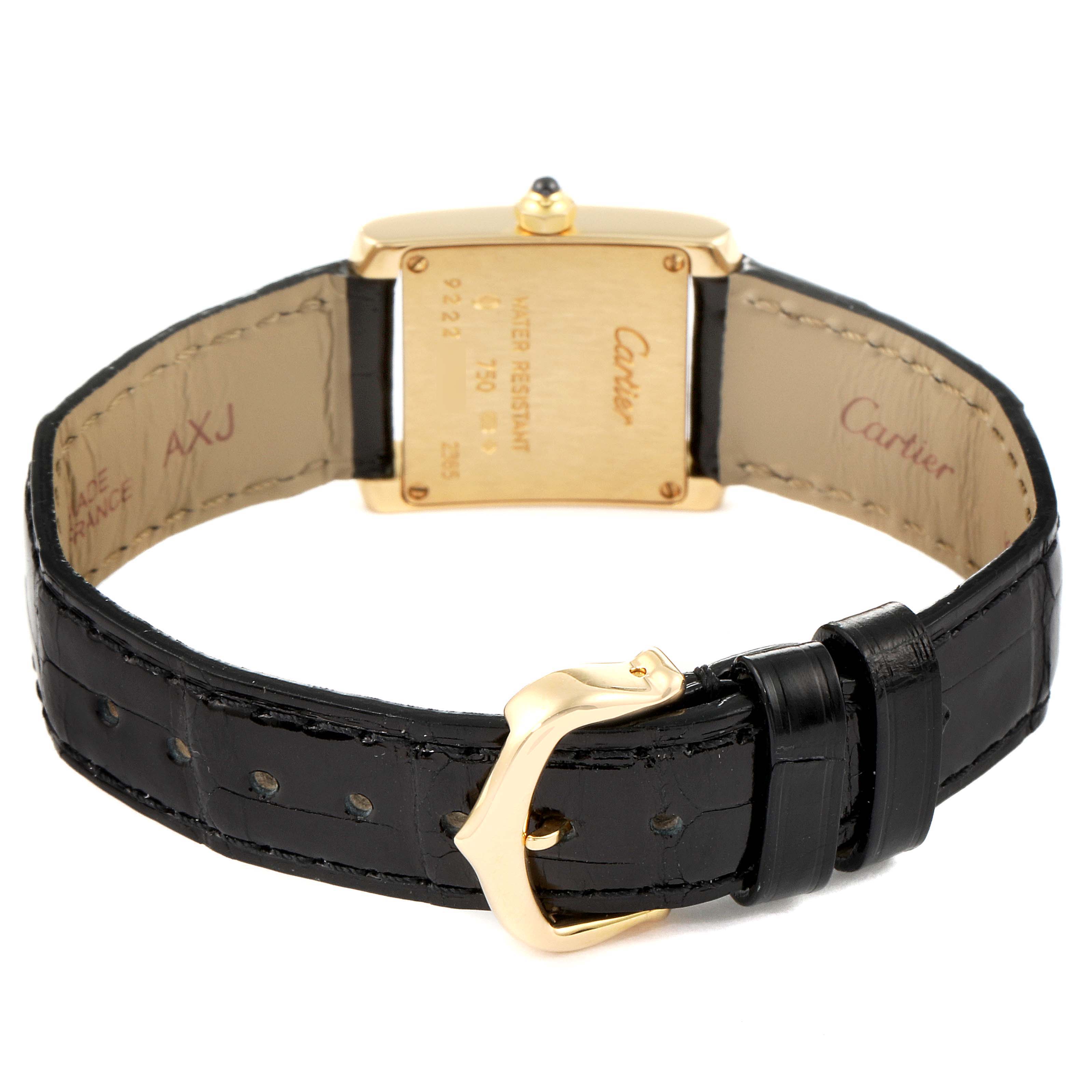 The image shows the back of a Cartier Tank Francaise W5000256 Women's Yellow Gold Silver Dial W5000256 Women's Yellow Gold Silver Dial watch, highlighting its strap and buckle.