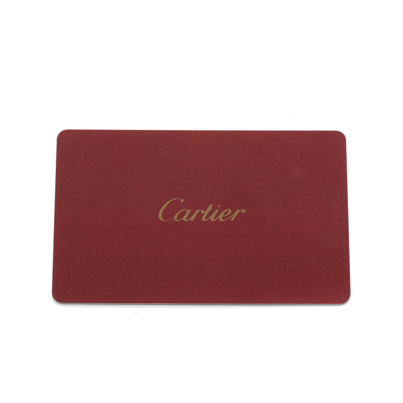 This image shows a red Cartier card, possibly an accessory or authentication card for a Tank Solo watch.