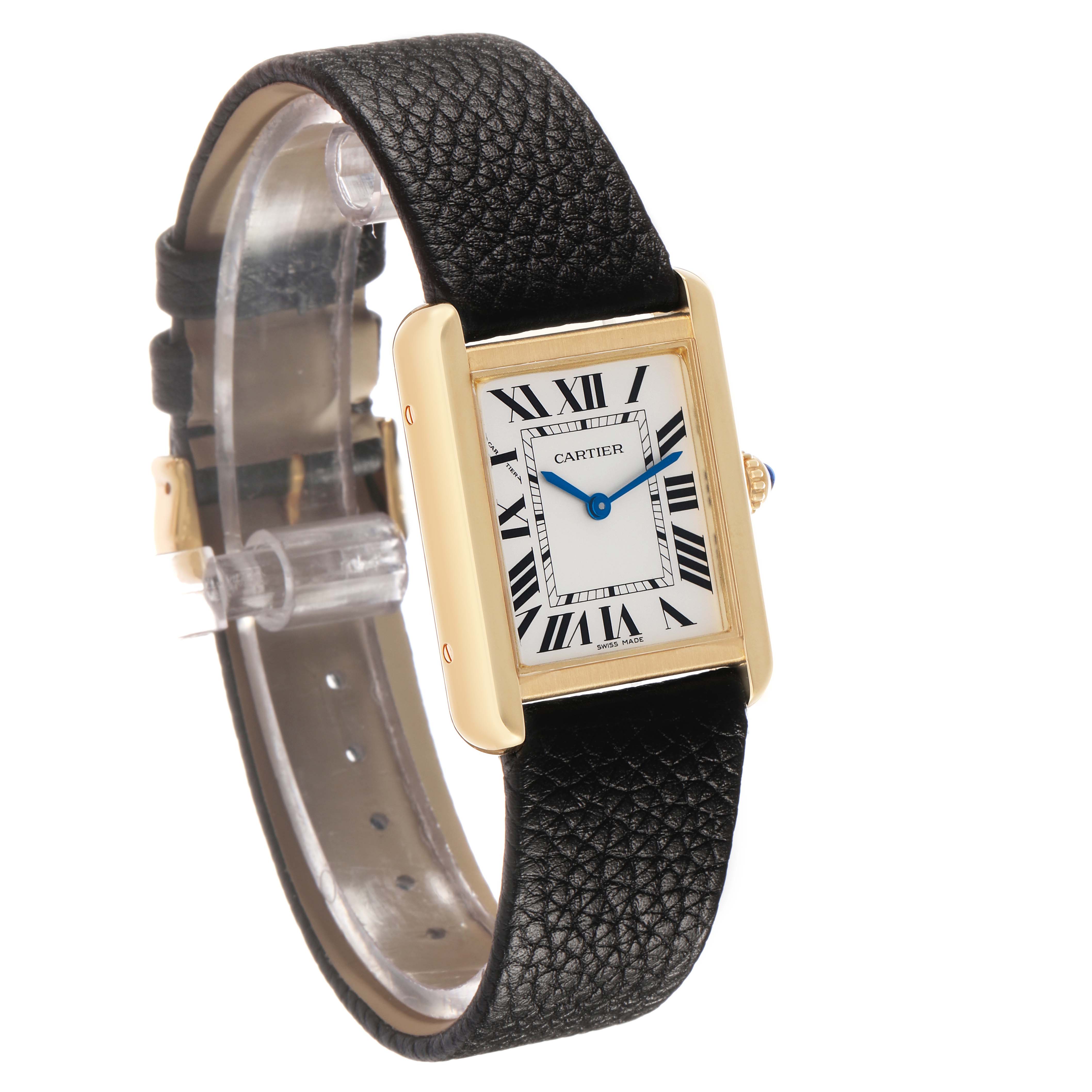 The Cartier Tank Solo W5200002 Women's Yellow Gold Silver Dial watch is shown at an angled side view, displaying its face, gold case, black leather strap, and crown.