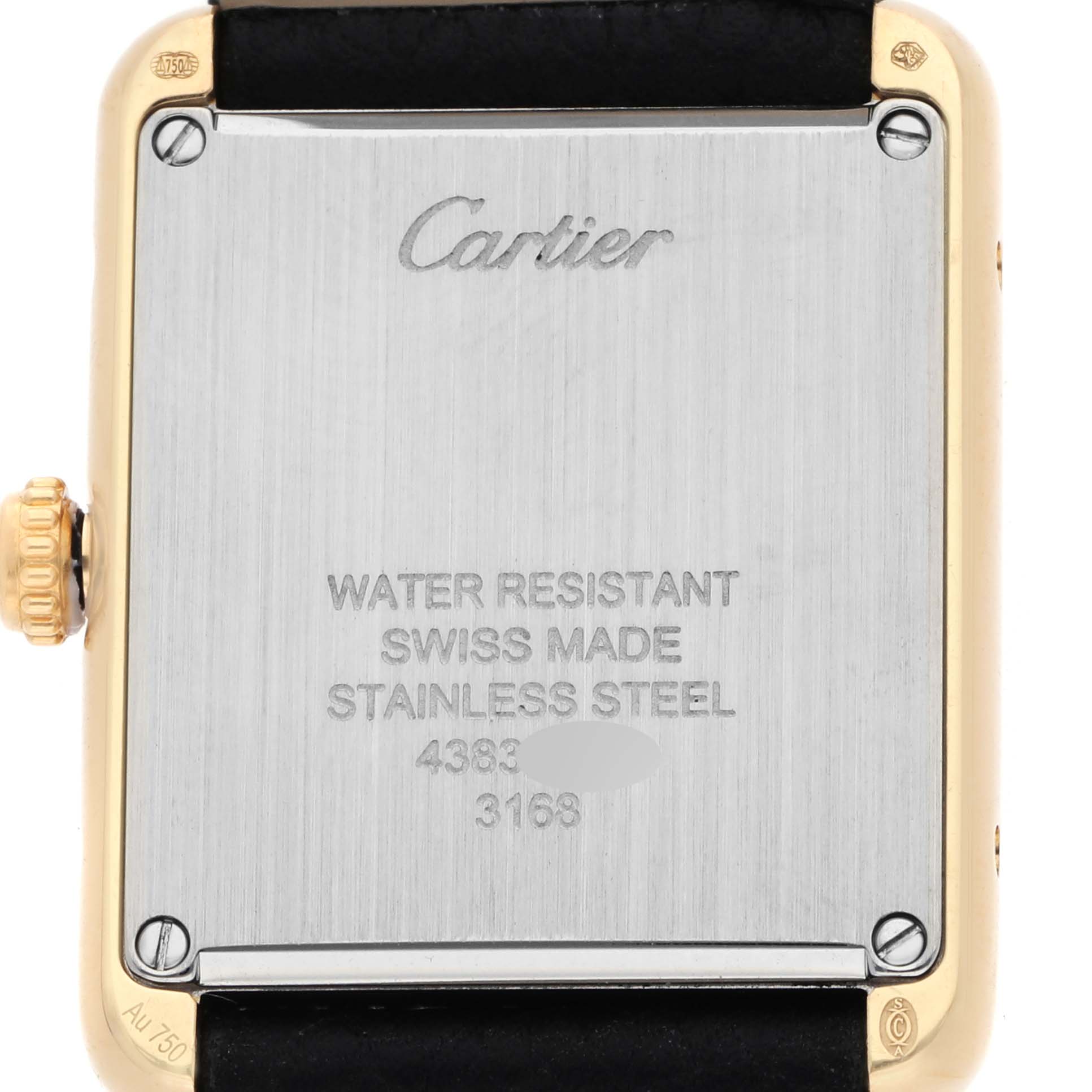 The image shows the back of the Cartier Tank Solo W5200002 Women's Yellow Gold Silver Dial watch, displaying the brand name and specifications.