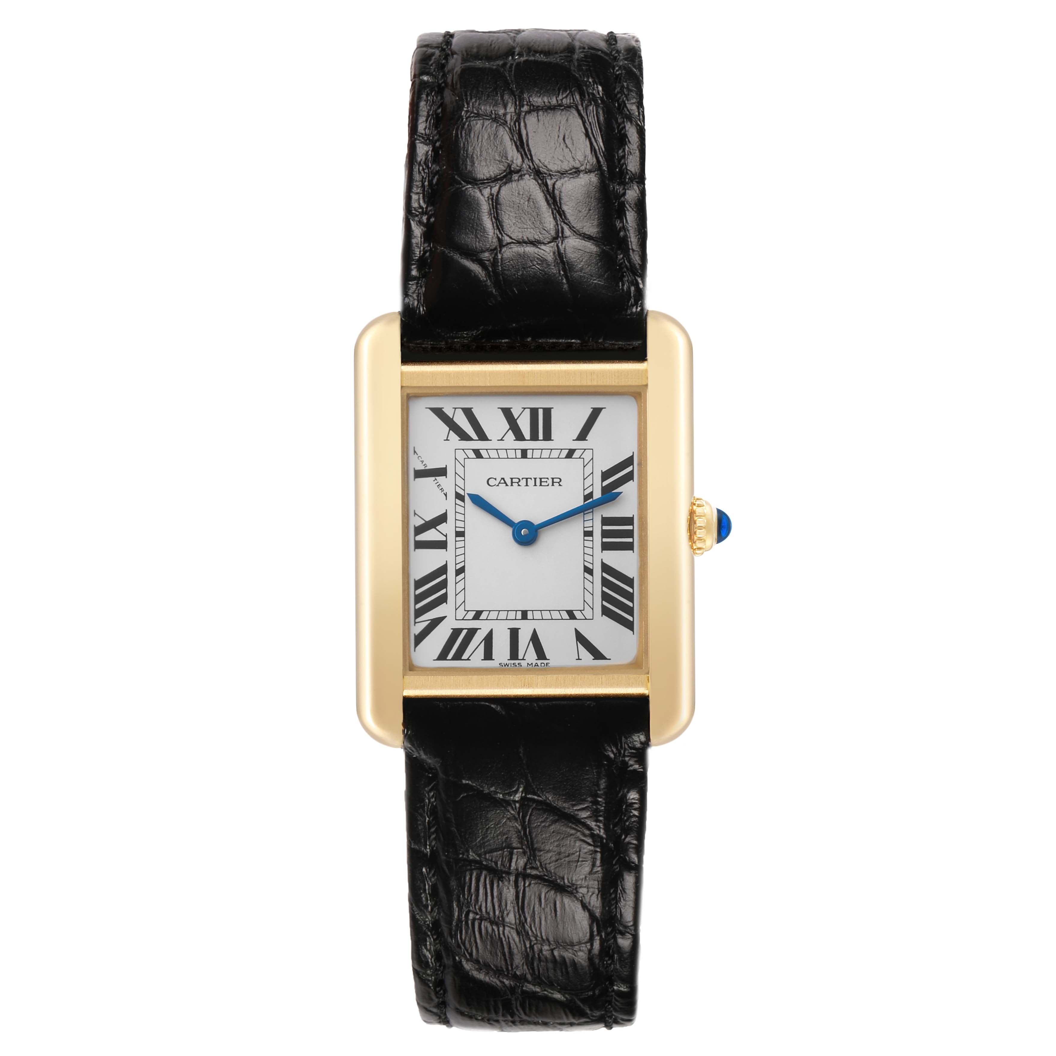The Cartier Tank Solo W5200002 Women's Yellow Gold Silver Dial watch is shown from a front angle, displaying its rectangular case, black leather strap, and blue hands.