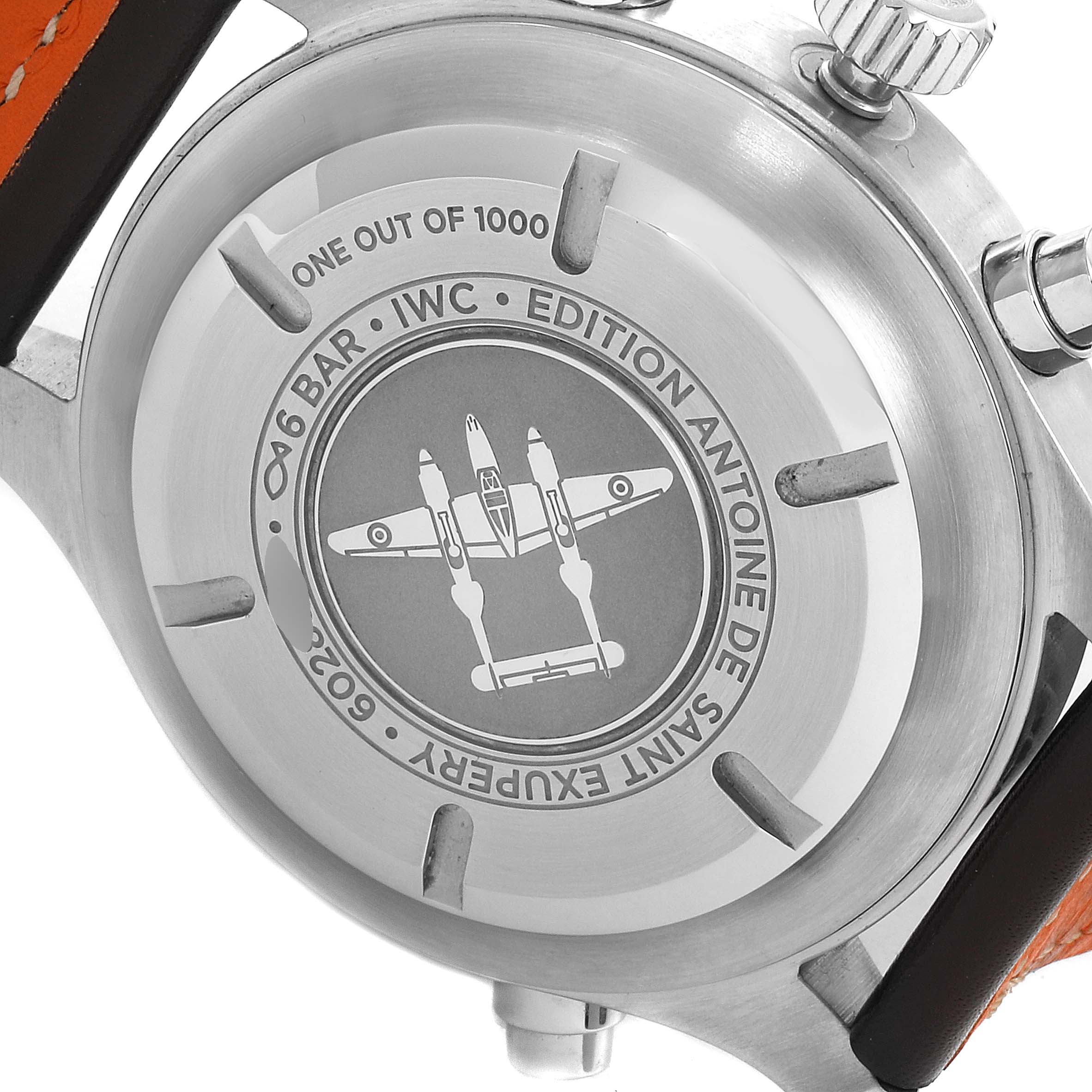 The image shows the back case of an IWC Pilot IW371808 Men's Stainless Steel Brown Dial IW371808 Men's Stainless Steel Brown Dial model watch engraved with "Edition Antoine De Saint Exupéry."