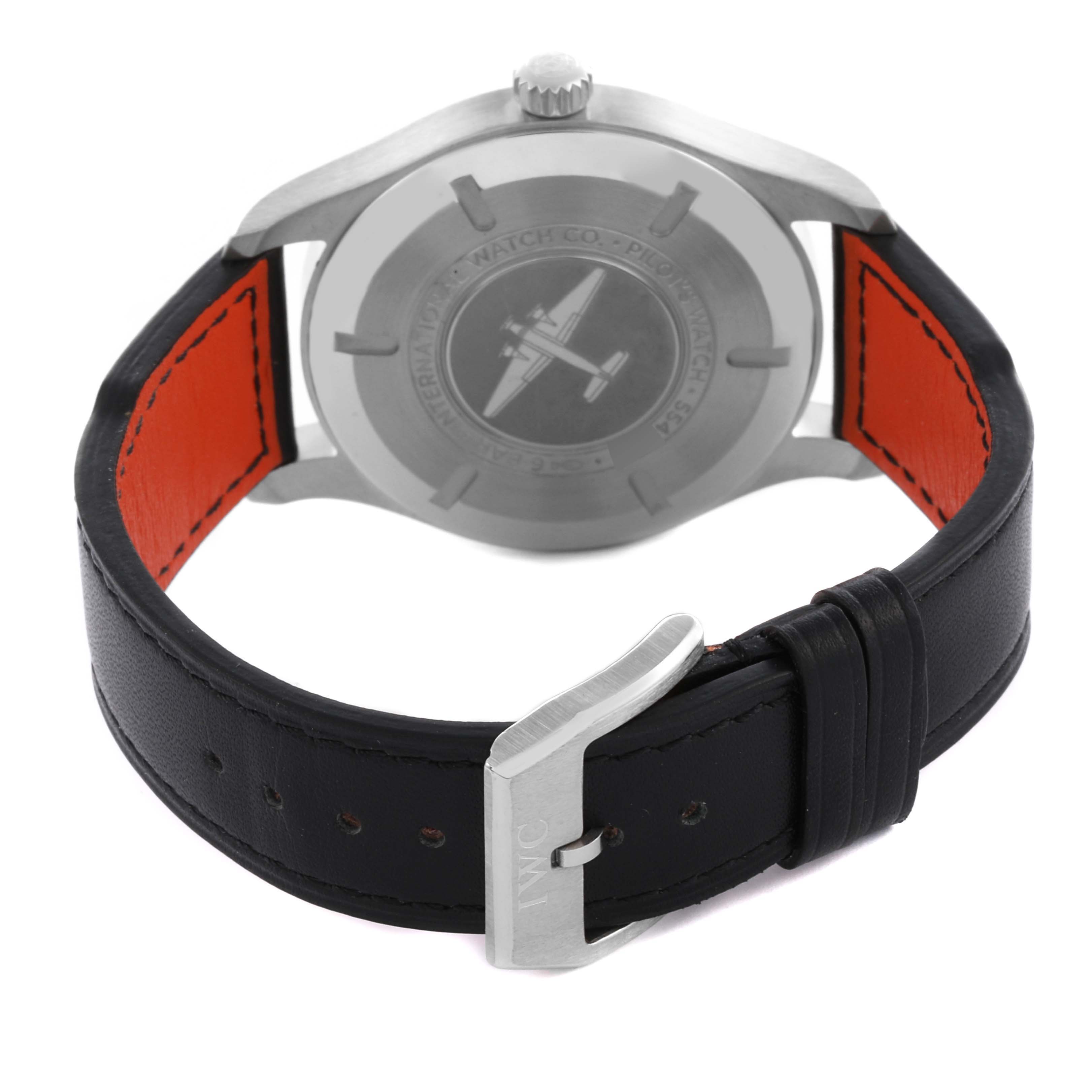 The IWC Pilot IW327002 Men's Stainless Steel White Dial IW327002 Men's Stainless Steel White Dial watch is shown from the back, featuring the case back, crown, and black leather strap with buckle.