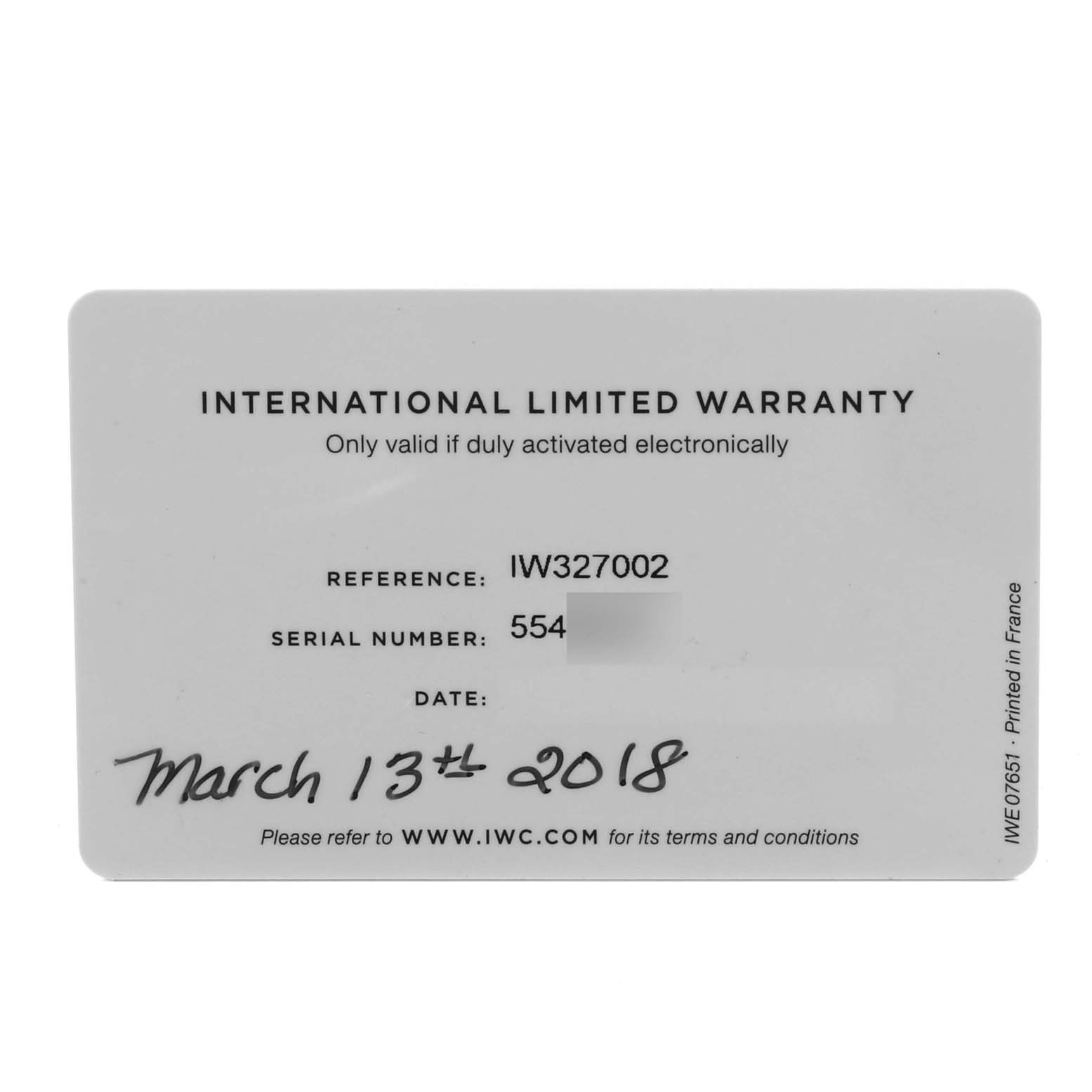 The image shows an IWC Pilot IW327002 Men's Stainless Steel White Dial IW327002 Men's Stainless Steel White Dial model International Limited Warranty card, featuring reference and serial numbers.