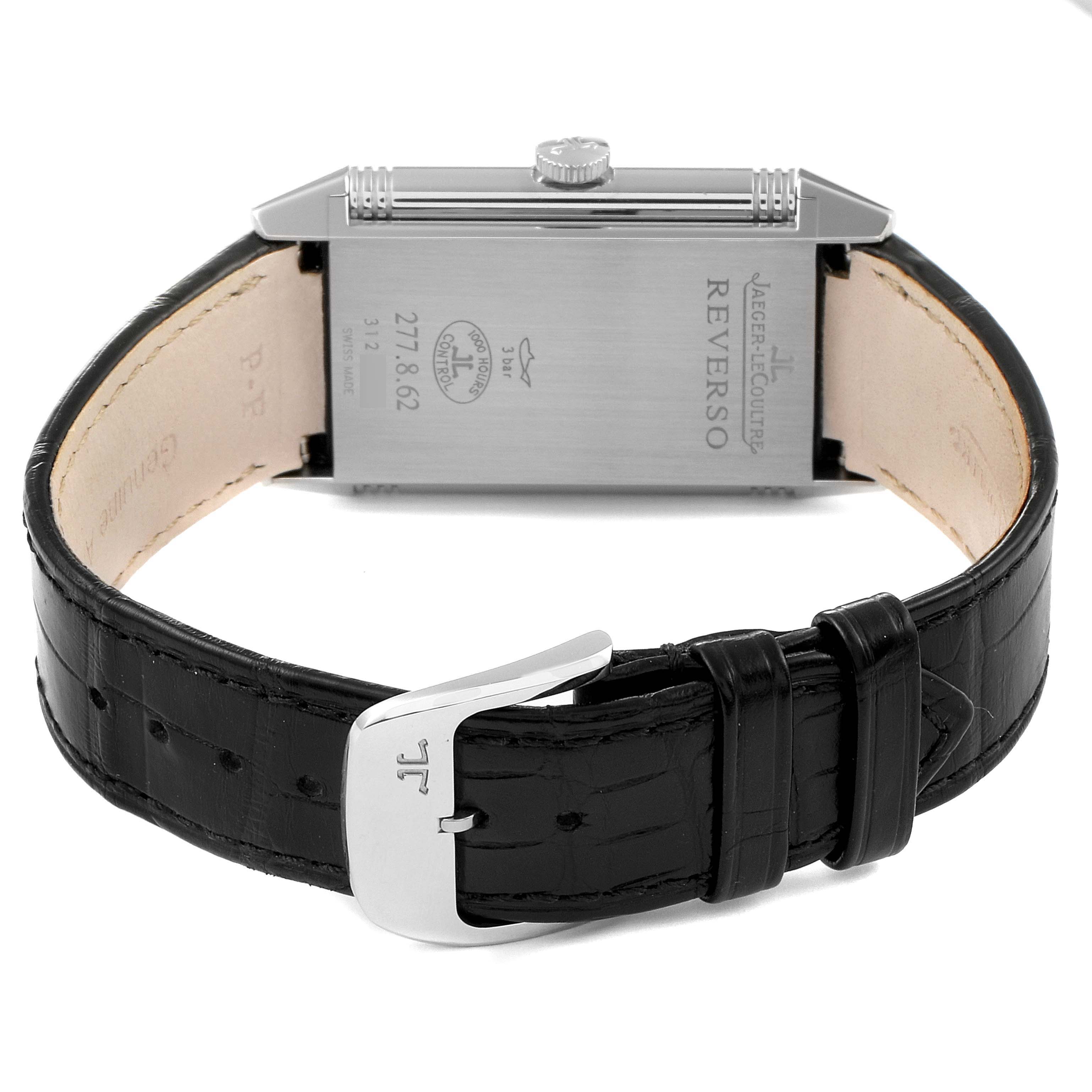 This image shows the back side of a Jaeger LeCoultre Reverso Q2788520 Men's Stainless Steel Silver Dial Q2788520 Men's Stainless Steel Silver Dial watch, including the caseback and part of the black leather strap with its buckle.